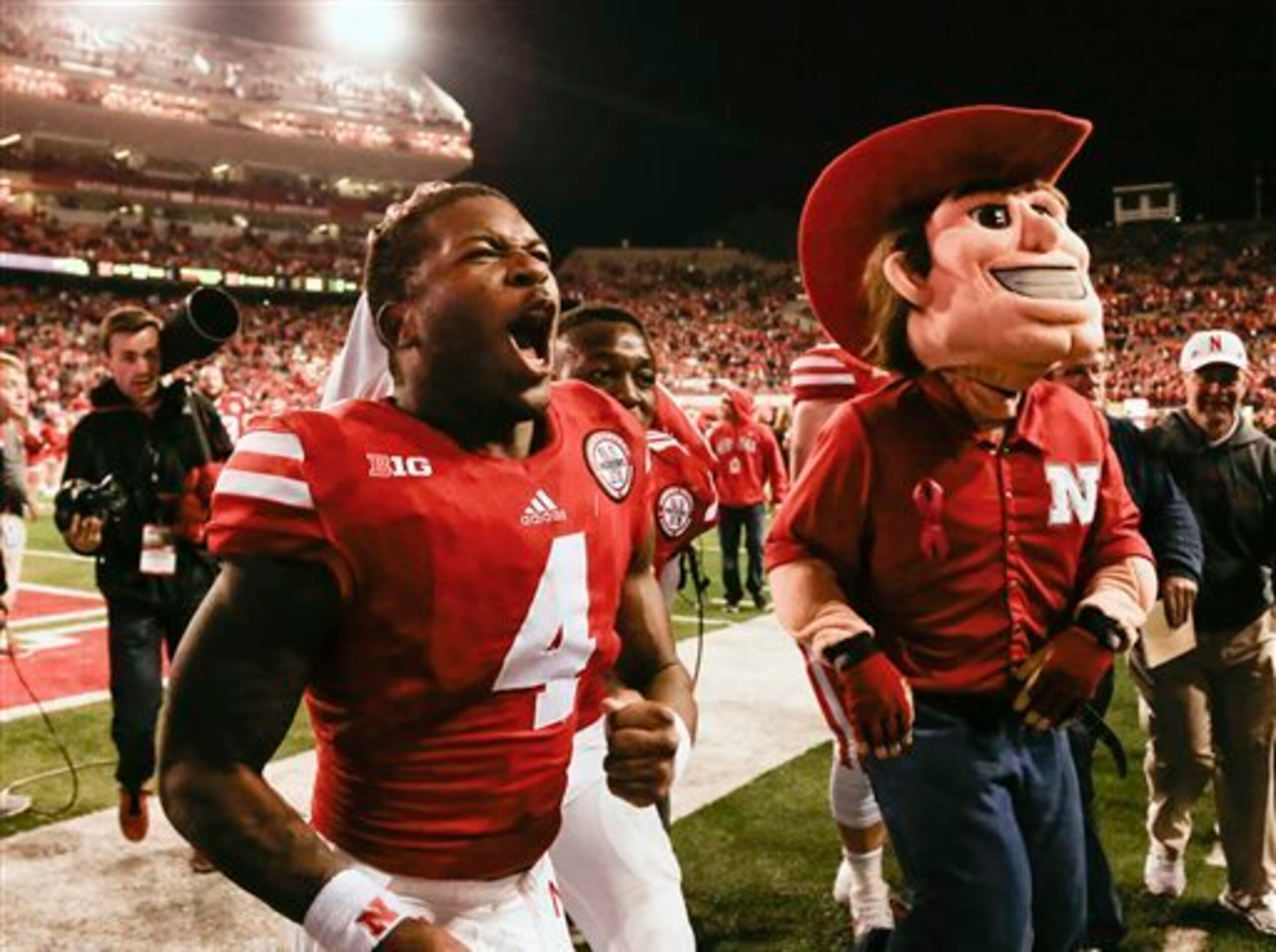 Nebraska QB Tommy Armstrong Jr. (left) Nebraska QB Tommy Armstrong Jr. (left)