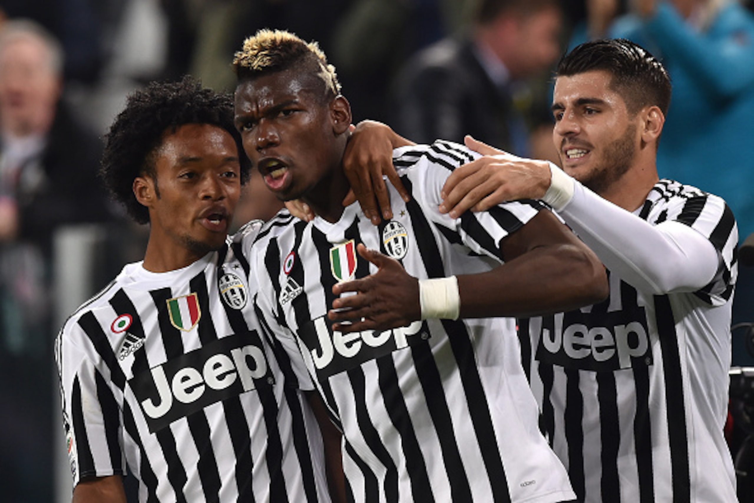 Pogba celebrates his dipping strike against Torino.