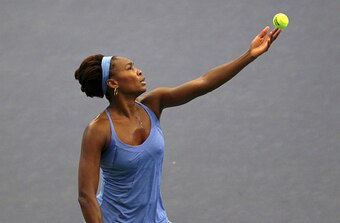 Venus Williams serves during an opening-round match at the WTA Elite Trophy in Zhurai, China.