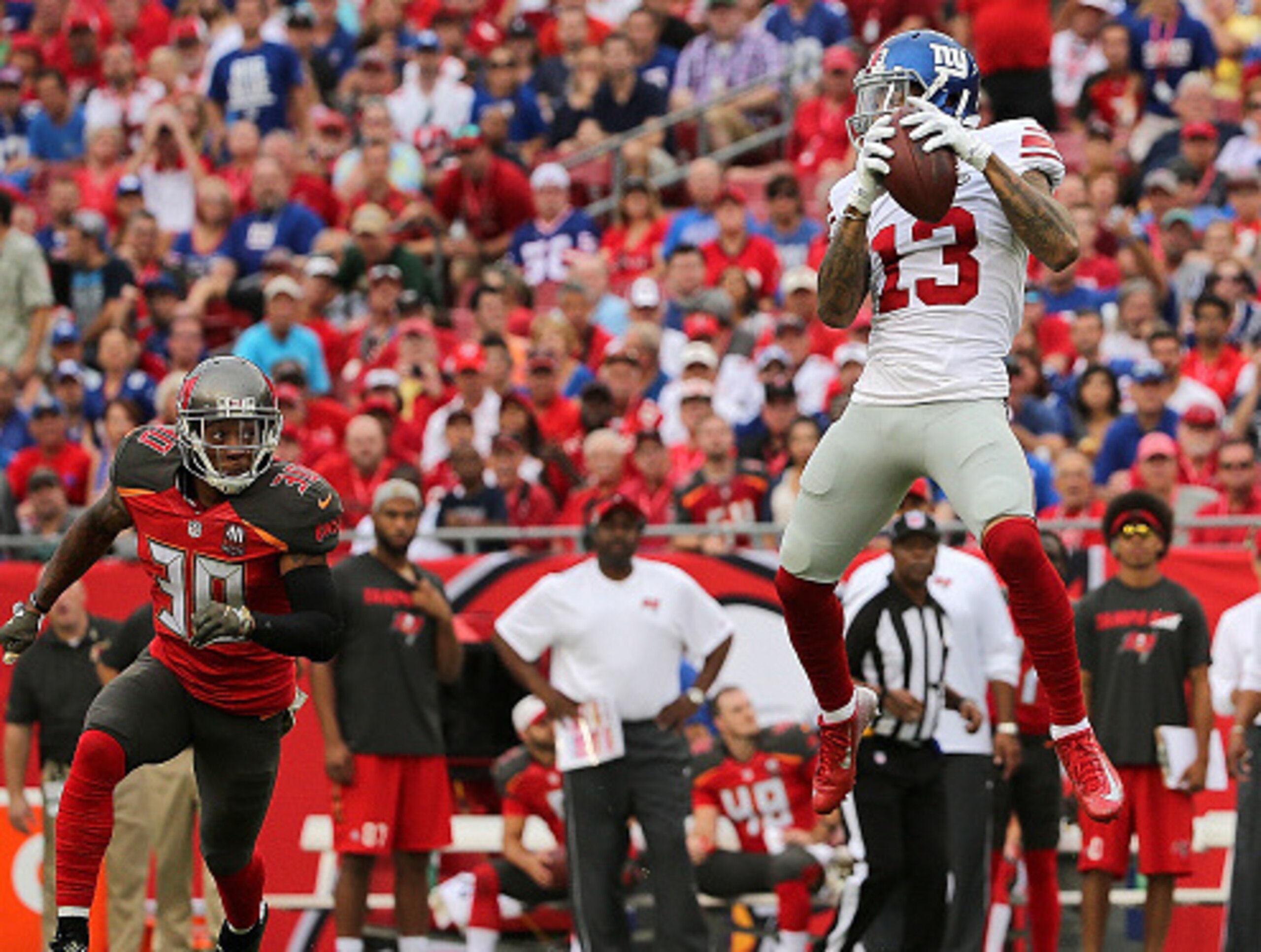 TAMPA, FL - NOVEMBER 08: Odell Beckham #13 of the New York Giants makes a catch during a game against the Tampa Bay Buccaneers at Raymond James Stadium on November 8, 2015 in Tampa, Florida. (Photo by Mike Ehrmann/Getty Images) TAMPA, FL - NOVEMBER 08: Odell Beckham #13 of the New York Giants makes a catch during a game against the Tampa Bay Buccaneers at Raymond James Stadium on November 8, 2015 in Tampa, Florida. (Photo by Mike Ehrmann/Getty Images)