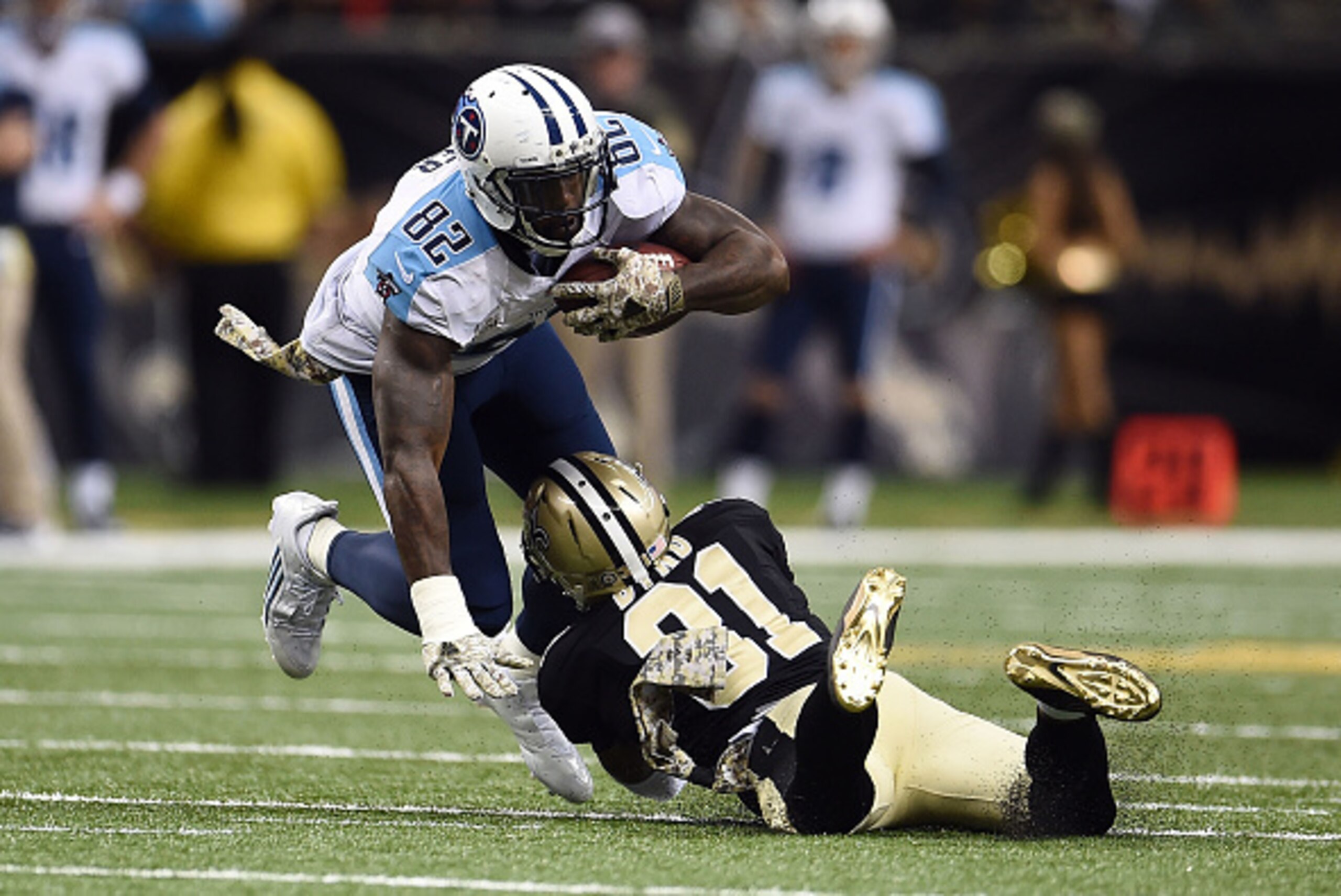 Delanie Walker (Left) finished with 2 TD's and 95 yards