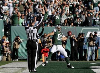 Eric Decker celebrates after scoring a touchdown against the Jaguars.