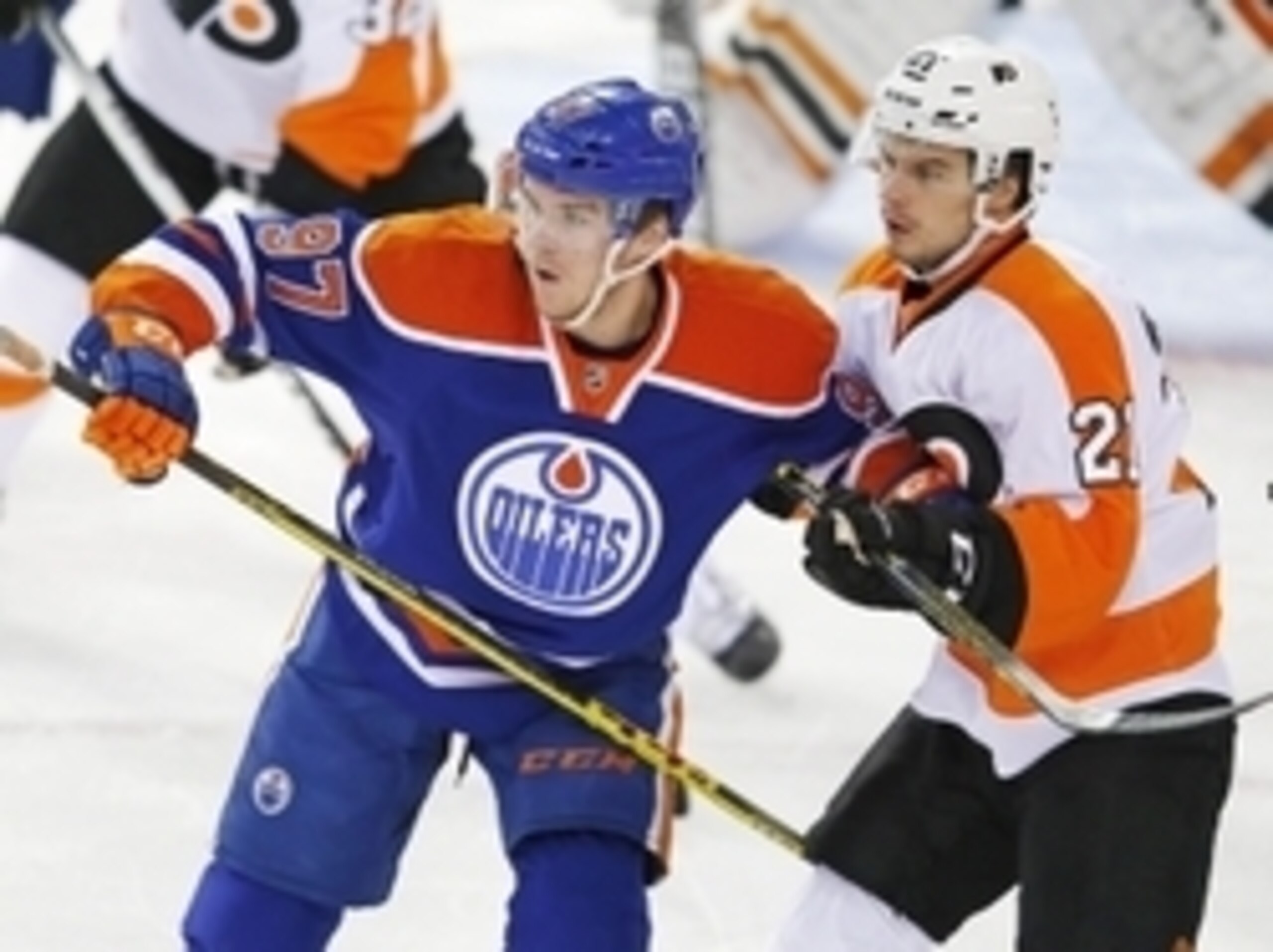Nov 3, 2015; Edmonton, Alberta, CAN; Edmonton Oilers forward Connor McDavid (97) and Philadelphia Flyers forward Scott Laughton (21) battle during the first period at Rexall Place. Mandatory Credit: Perry Nelson-USA TODAY Sports