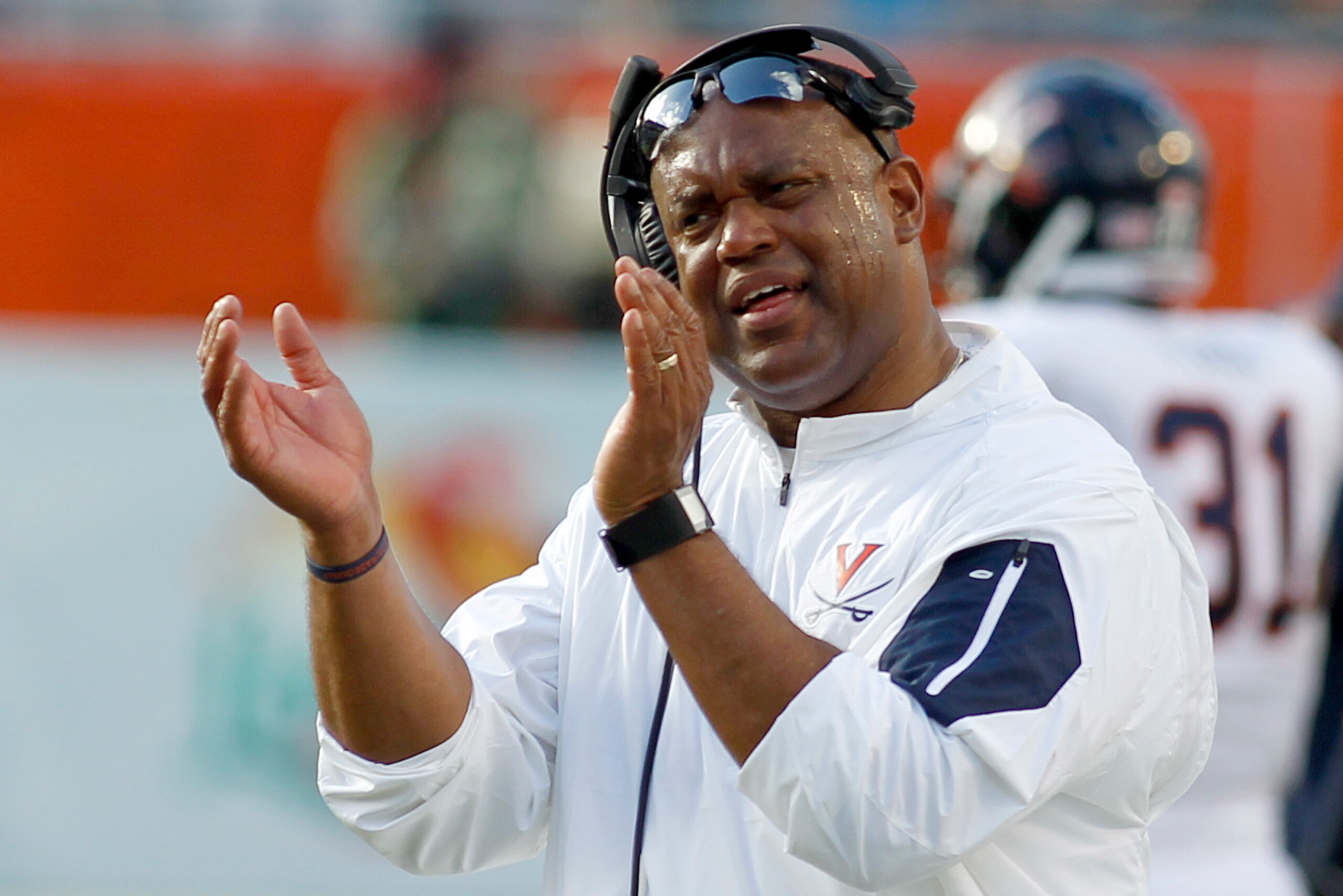Virginia's Mike London could need a strong finish to save his job.