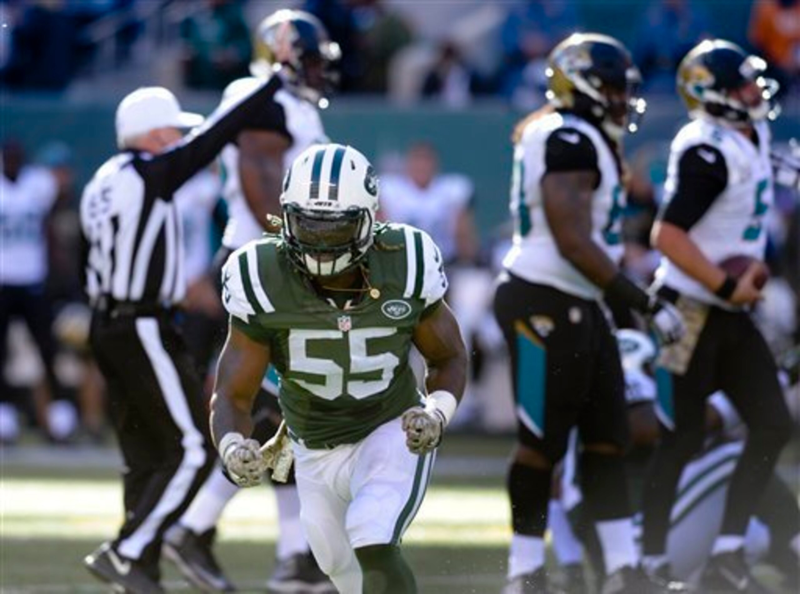 Lorenzo Mauldin (55) celebrates a sack. Lorenzo Mauldin (55) celebrates a sack.
