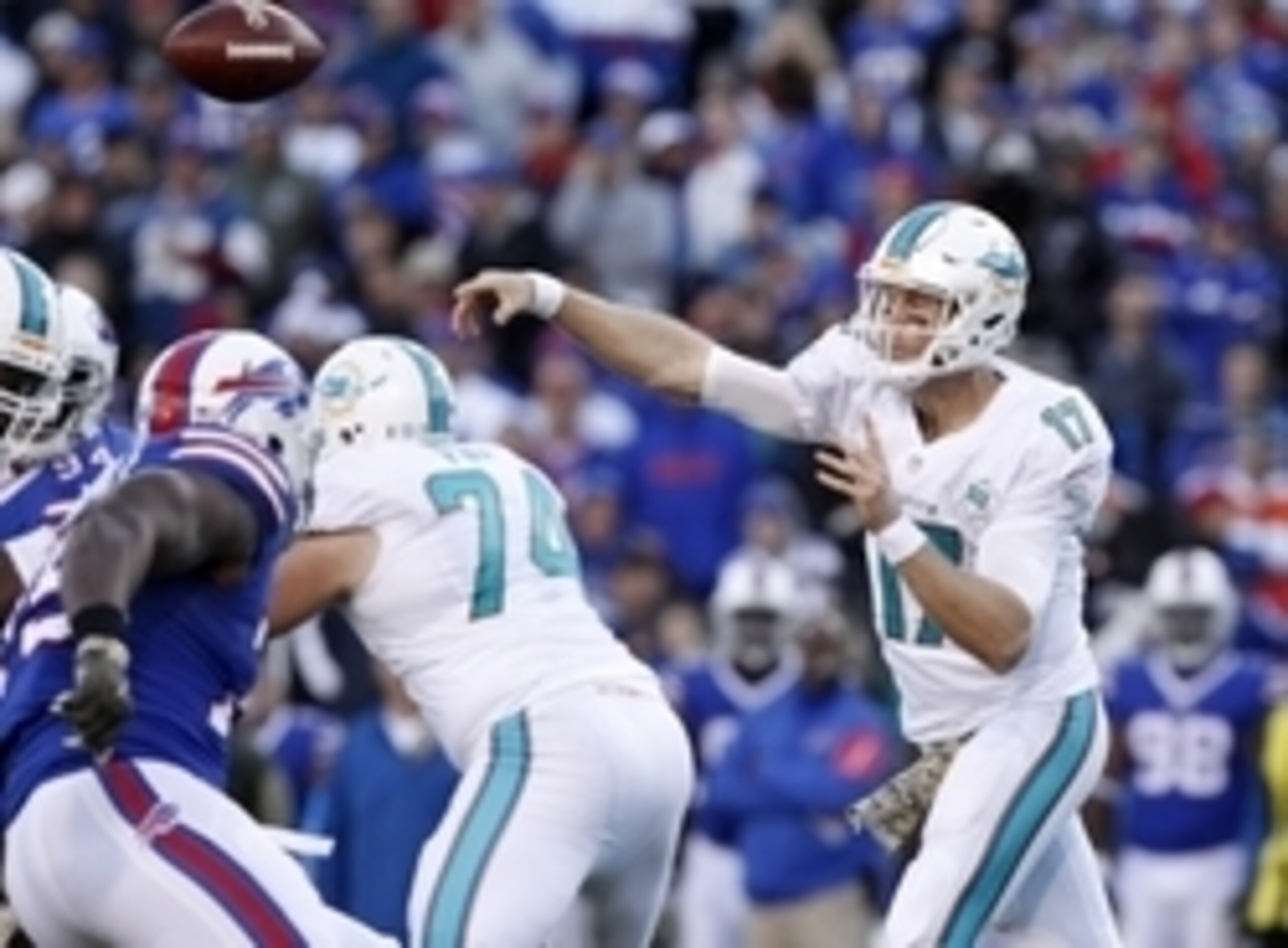Nov 8, 2015; Orchard Park, NY, USA; Miami Dolphins quarterback Ryan Tannehill (17) throws a pass under pressure by the Buffalo Bills defense during the second half at Ralph Wilson Stadium. The Bills beat the Dolphins 33-17. Mandatory Credit: Kevin Hoffman Nov 8, 2015; Orchard Park, NY, USA; Miami Dolphins quarterback Ryan Tannehill (17) throws a pass under pressure by the Buffalo Bills defense during the second half at Ralph Wilson Stadium. The Bills beat the Dolphins 33-17. Mandatory Credit: Kevin Hoffman