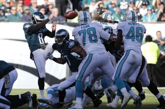 Miami's Zach Vigil blocks a punt.