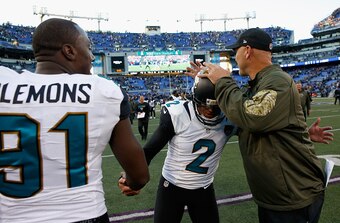 Gus Bradley celebrates with kicker Jason Myers.