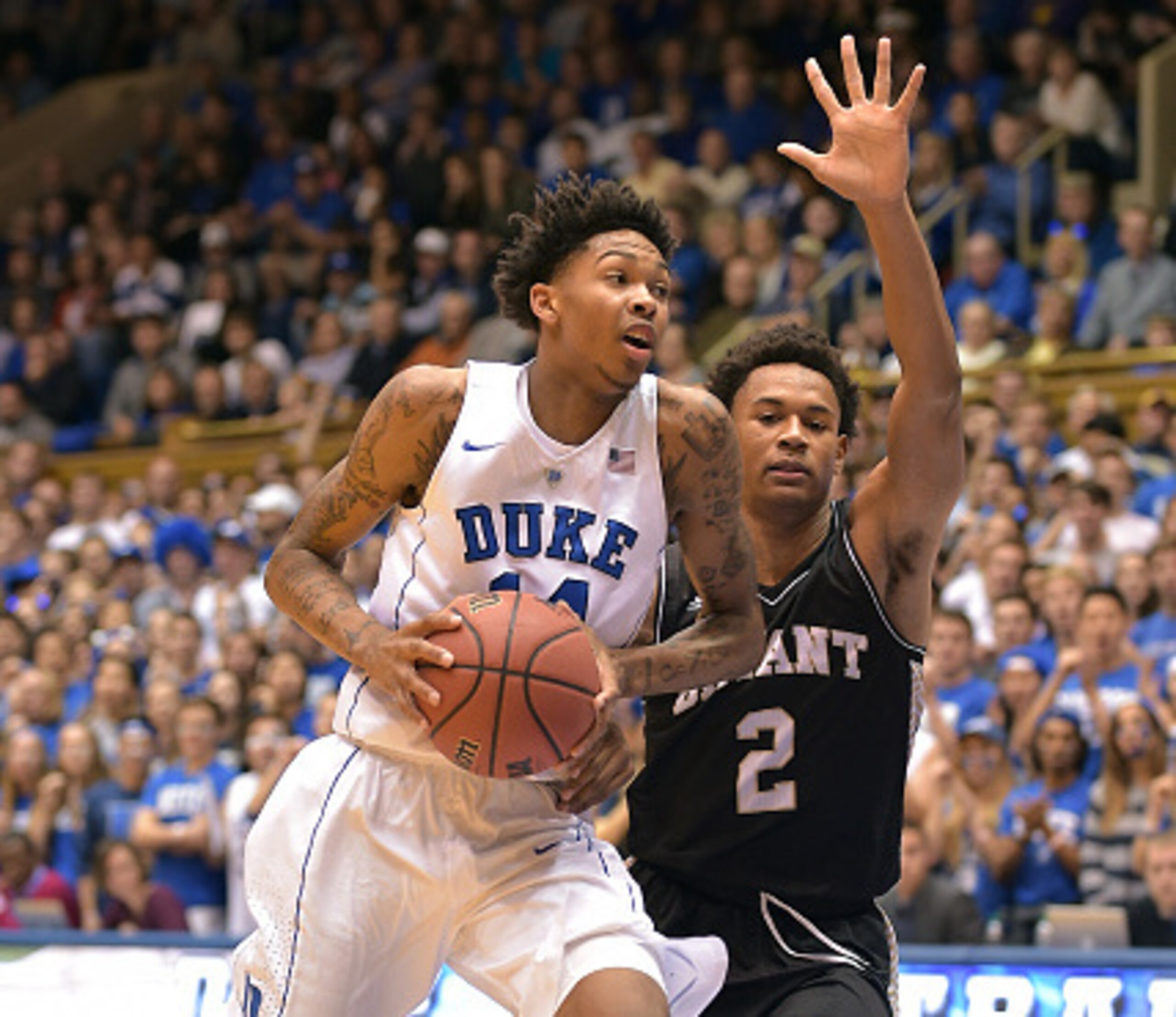DURHAM, NC - NOVEMBER 14: Brandon Ingram #14 of the Duke Blue Devils drives against Nisre Zouzoua #2 of the Bryant Bulldogs at Cameron Indoor Stadium on November 14, 2015 in Durham, North Carolina. Duke defeated Bryant 113-75. (Photo by Lance King/Getty I