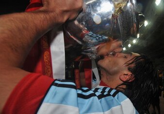 Carlos Tevez celebrates in Moscow.