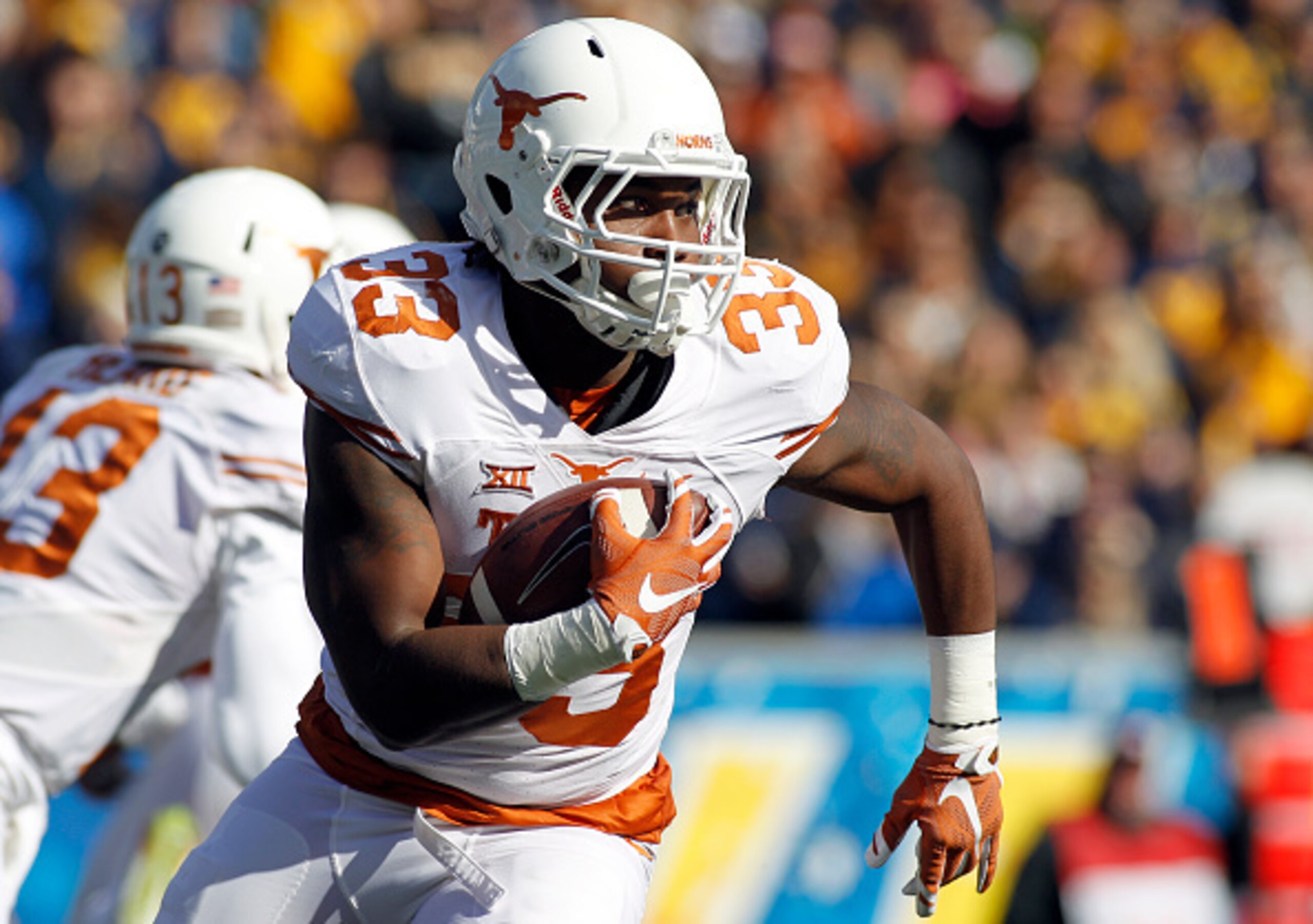 MORGANTOWN, WV - NOVEMBER 14: D'Onta Foreman #33 of the Texas Longhorns rushes in the first half against the West Virginia Mountaineers during the game on November 14, 2015 at Mountaineer Field in Morgantown, West Virginia. (Photo by Justin K. Aller/Get MORGANTOWN, WV - NOVEMBER 14: D'Onta Foreman #33 of the Texas Longhorns rushes in the first half against the West Virginia Mountaineers during the game on November 14, 2015 at Mountaineer Field in Morgantown, West Virginia. (Photo by Justin K. Aller/Get