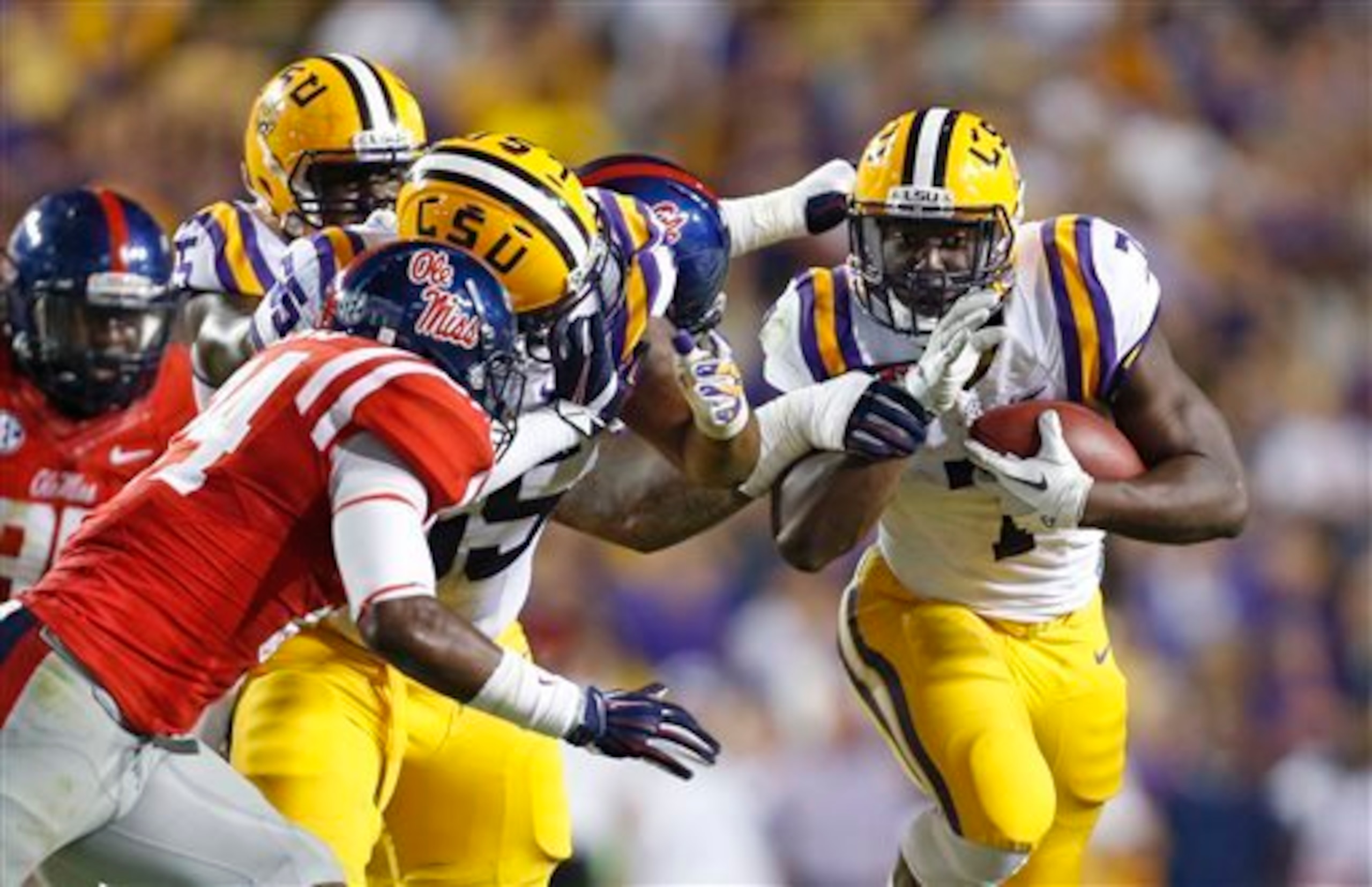 LSU RB Leonard Fournette (right)