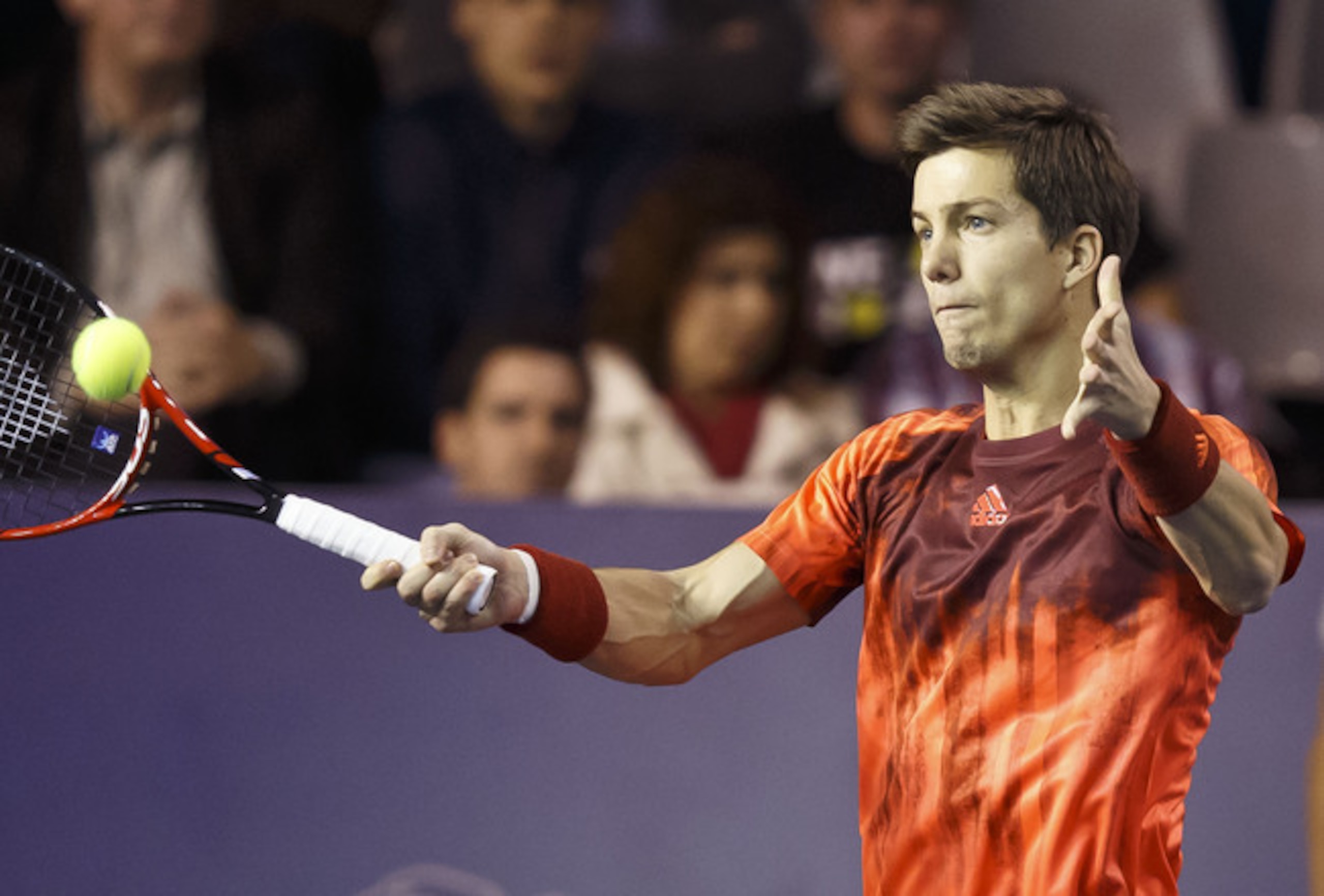 Aljaz Bedene hits a forehand during the 2015 Paris Masters.