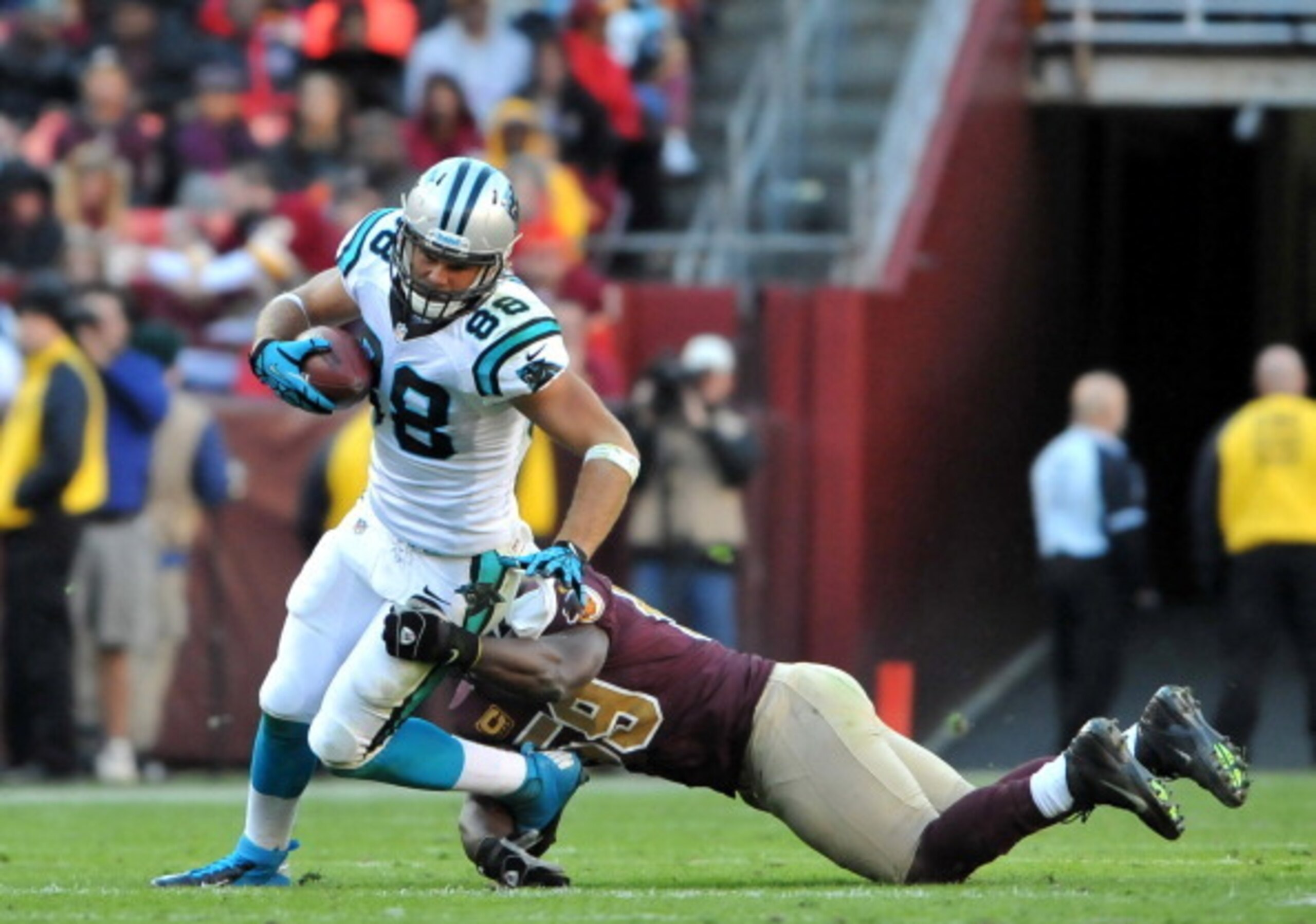 LANDOVER, MD - NOVEMBER 4: Greg Olsen #88 of the Carolina Panthers runs the ball against the Washington Redskins at FedExField on November 4, 2012 in Landover, Maryland. The Panthers defeated the Redskins 21-13. (Photo by Larry French/Getty Images)