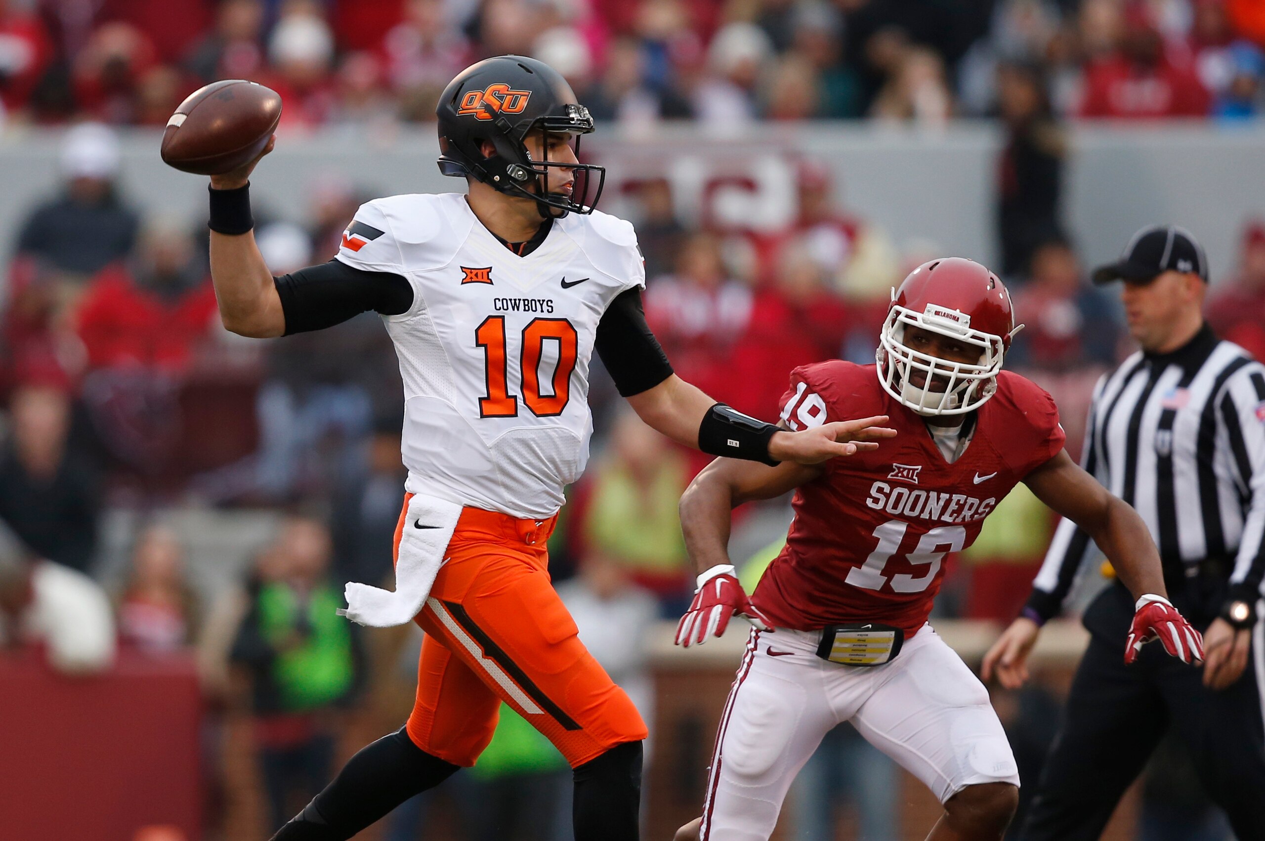 Oklahoma State QB Mason Rudolph and Oklahoma LB Eric Striker Oklahoma State QB Mason Rudolph and Oklahoma LB Eric Striker