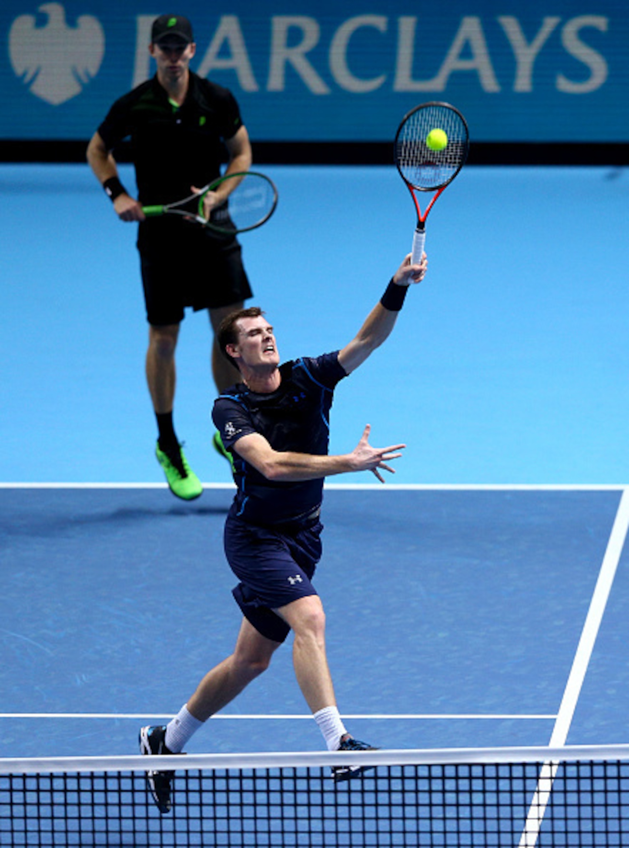 A tennis cameraman responsible for overhead shots barely has to move his camera
