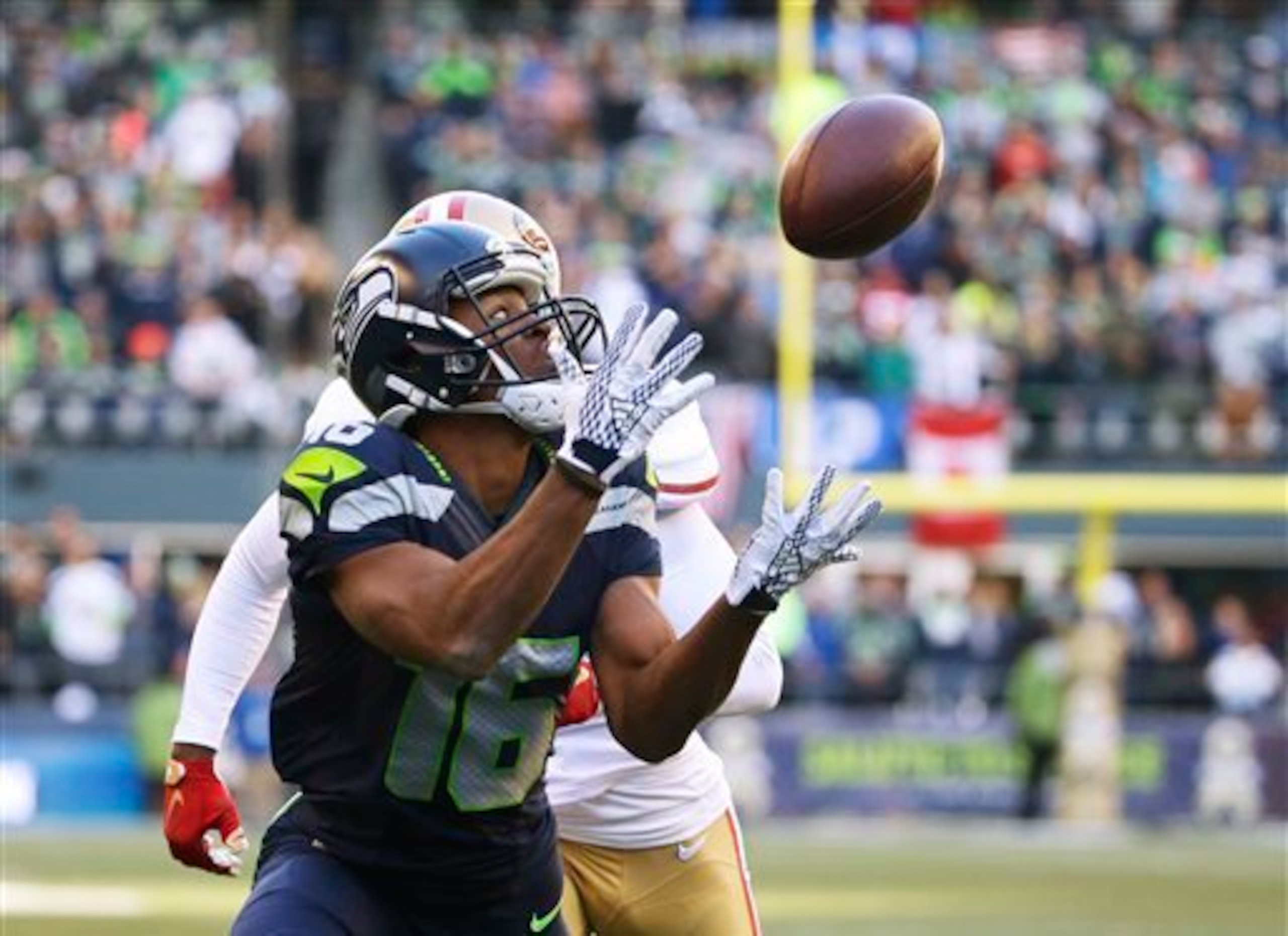 Rookie Tyler Lockett burns Jimmie Ward for a touchdown during the first quarter