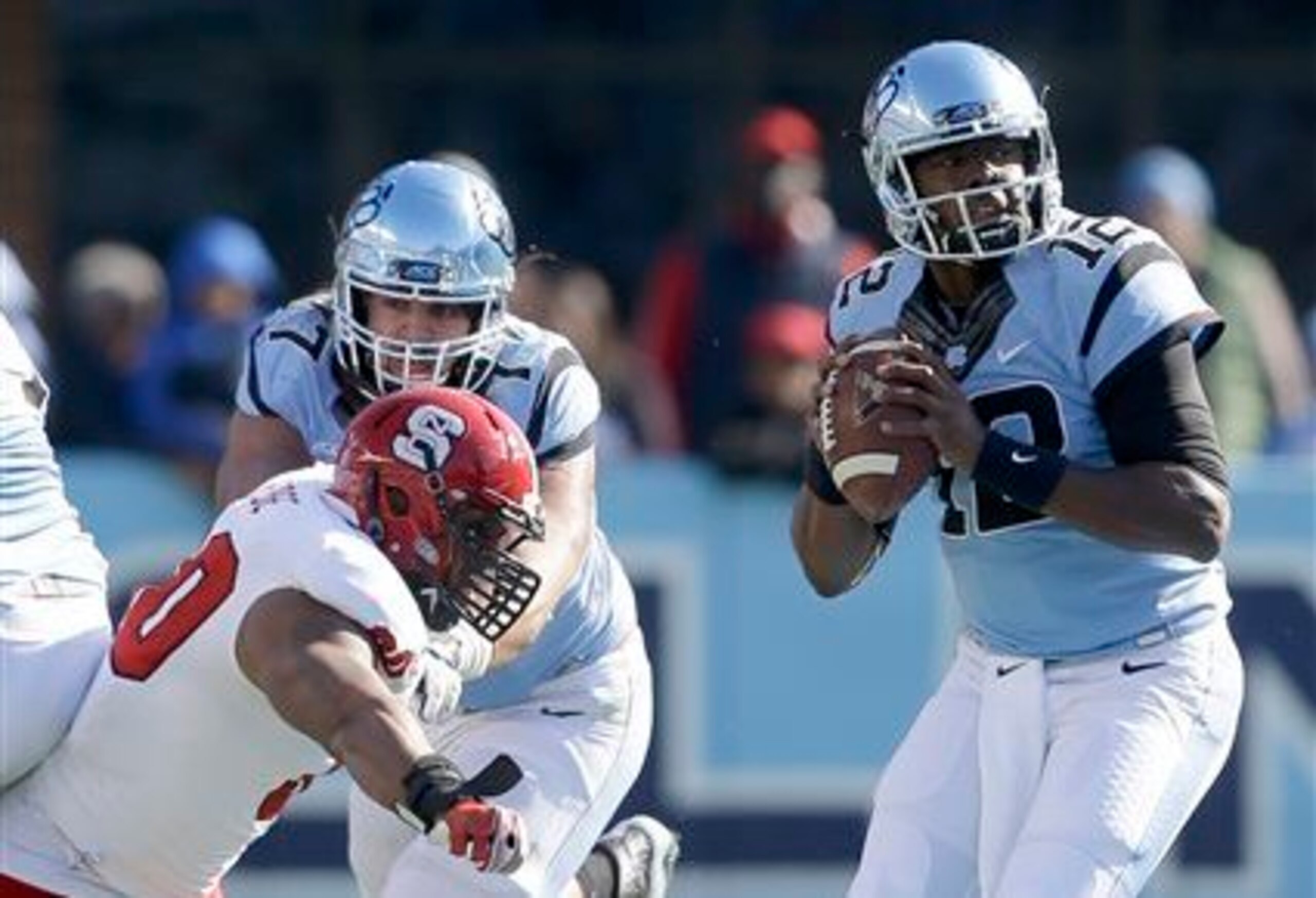 North Carolina QB Marquise Williams (right)