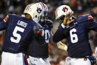 Nov 21, 2015; Auburn, AL, USA; Auburn Tigers quarterback Jeremy Johnson (6) celebrates a touchdown with wide receiver Ricardo Louis (5) during the third quarter against the Idaho Vandals at Jordan Hare Stadium. Auburn won 56-34. Mandatory Credit: Shanna L