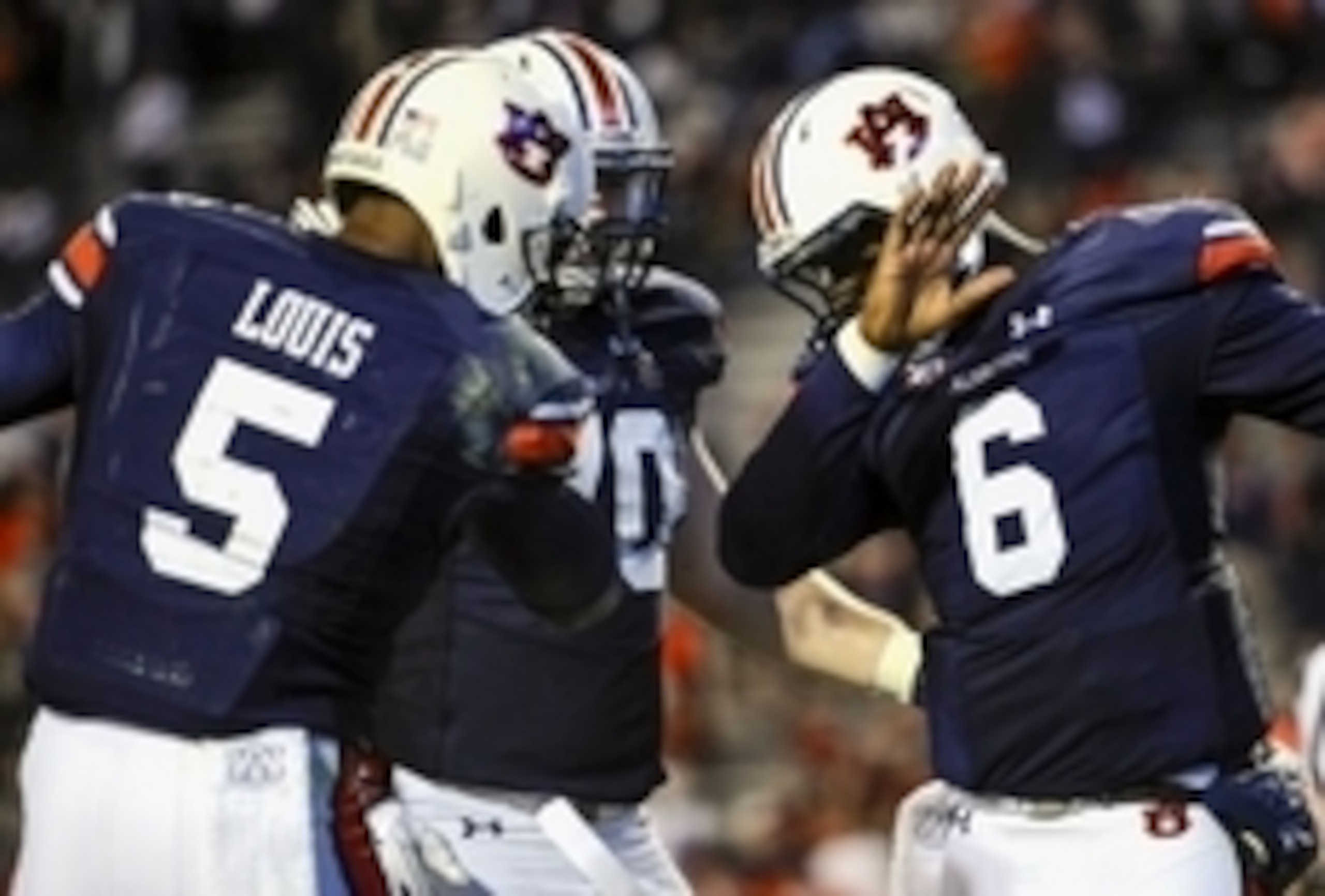 Nov 21, 2015; Auburn, AL, USA; Auburn Tigers quarterback Jeremy Johnson (6) celebrates a touchdown with wide receiver Ricardo Louis (5) during the third quarter against the Idaho Vandals at Jordan Hare Stadium. Auburn won 56-34. Mandatory Credit: Shanna L