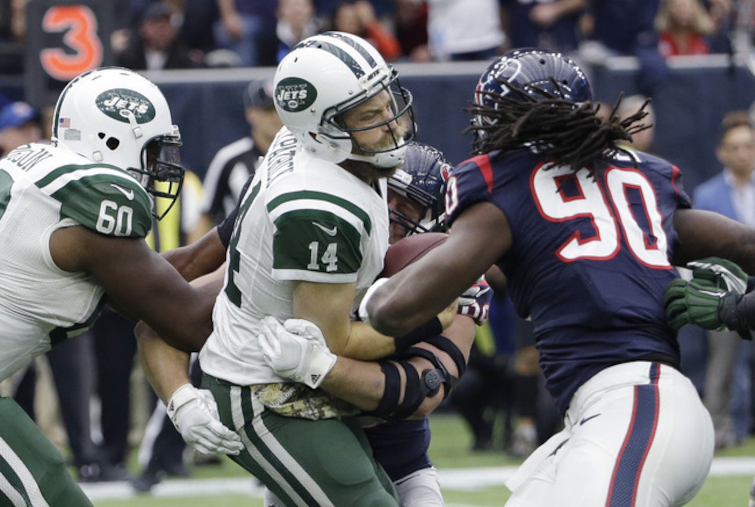 Ryan Fitzpatrick is sacked by J.J. Watt in last weekend's loss to the Texans.