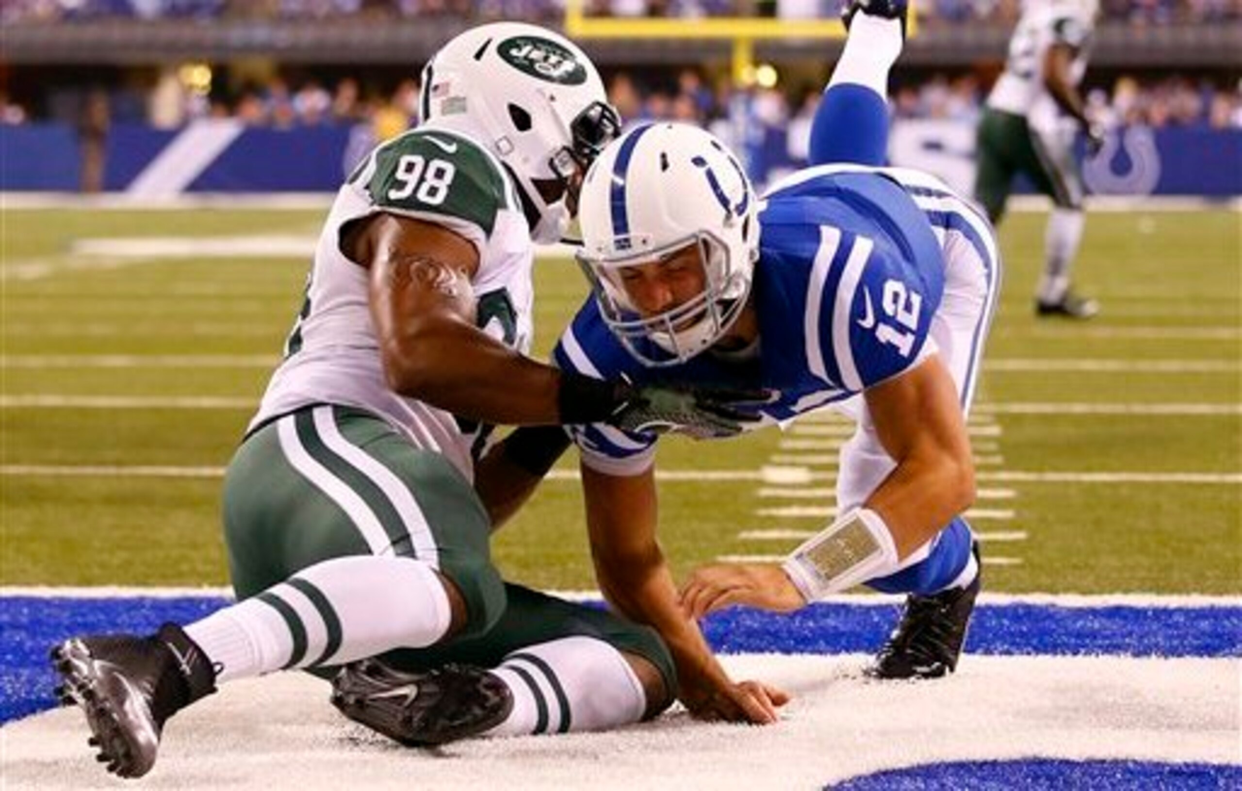 Quinton Coples tackles Andrew Luck.