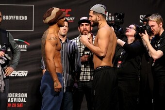 Benson Henderson (left) and Jorge Masvidal