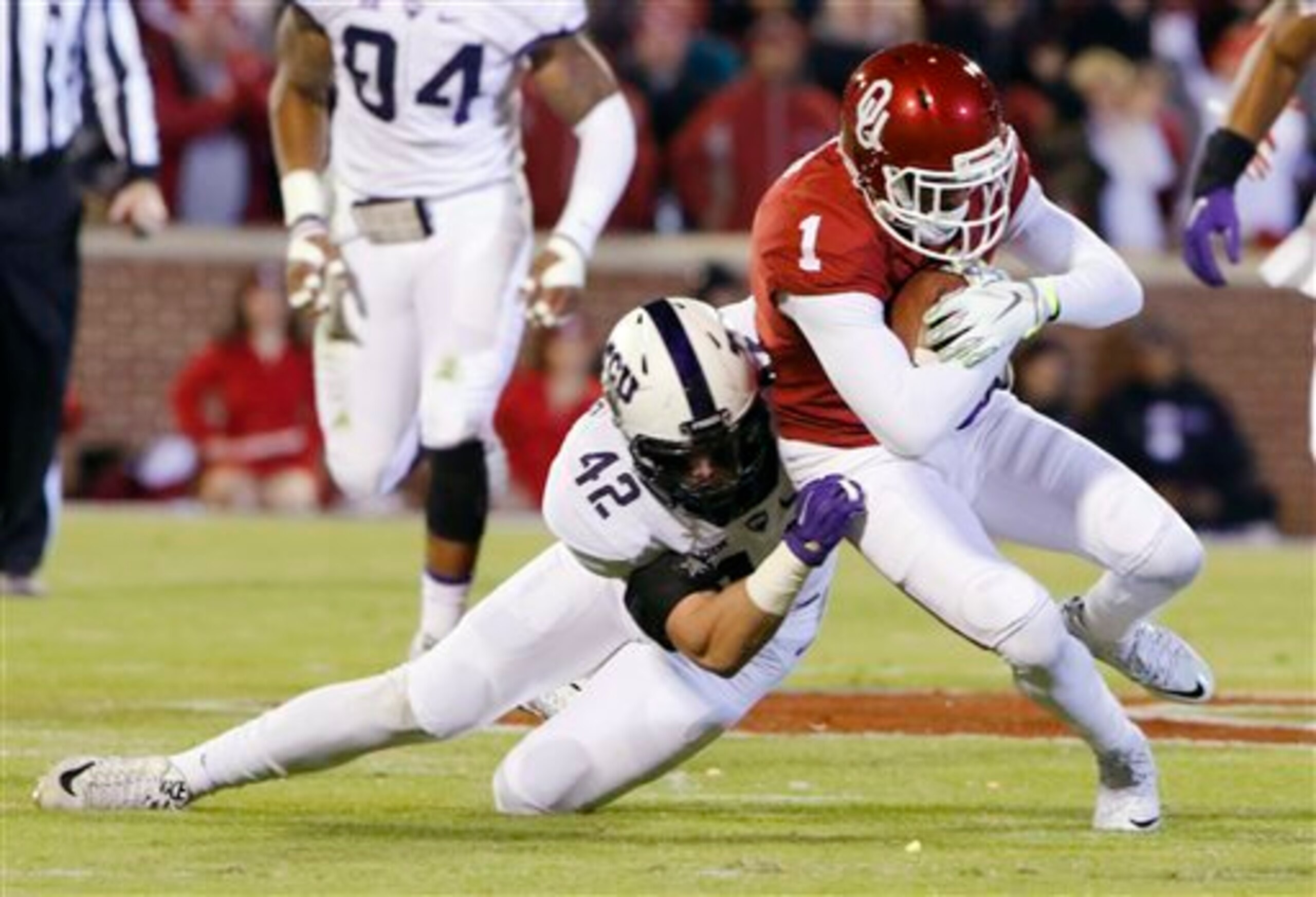 TCU LB Ty Summers (left) vs. Oklahoma earlier this season