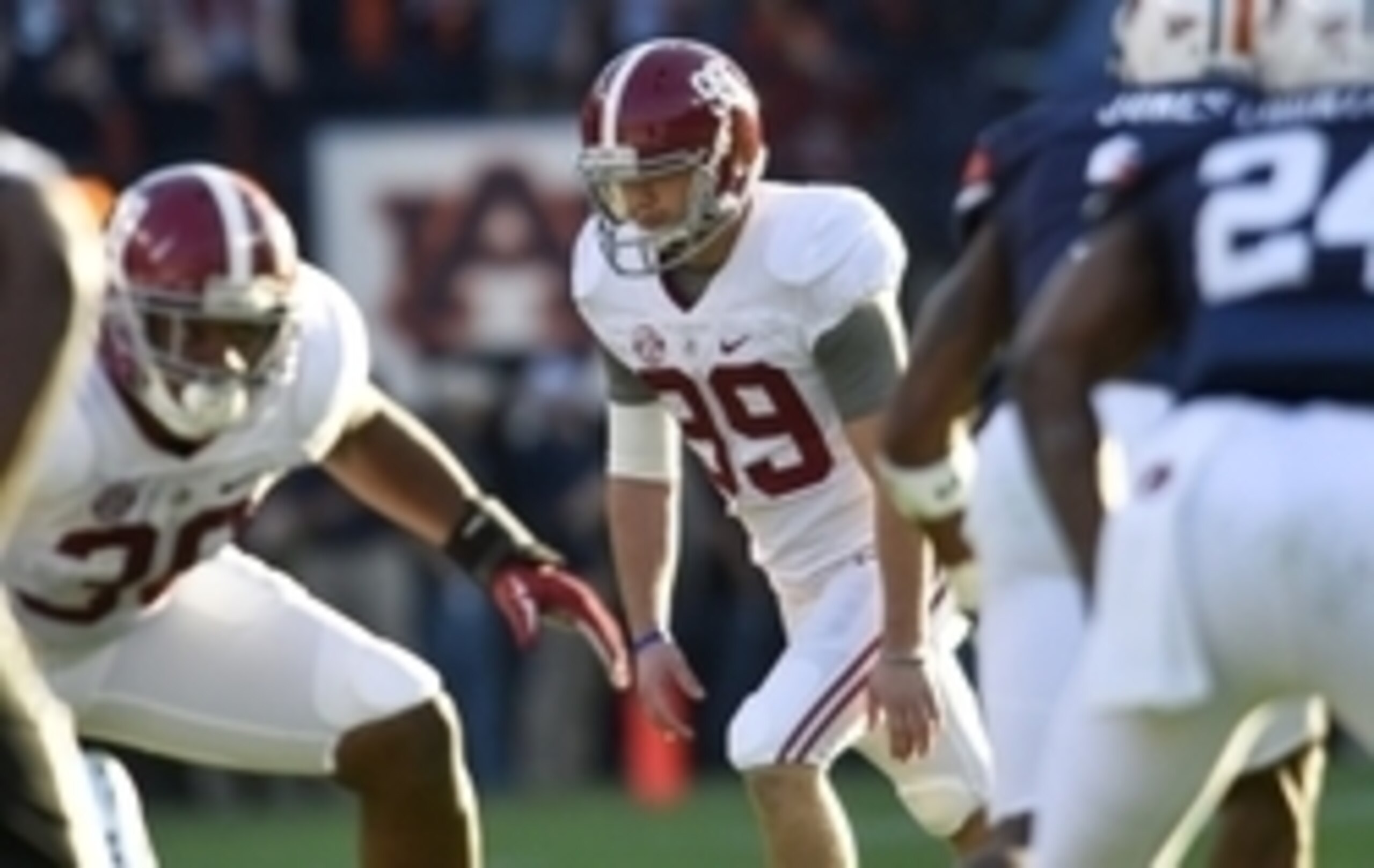 Alabama K Adam Griffith (center)