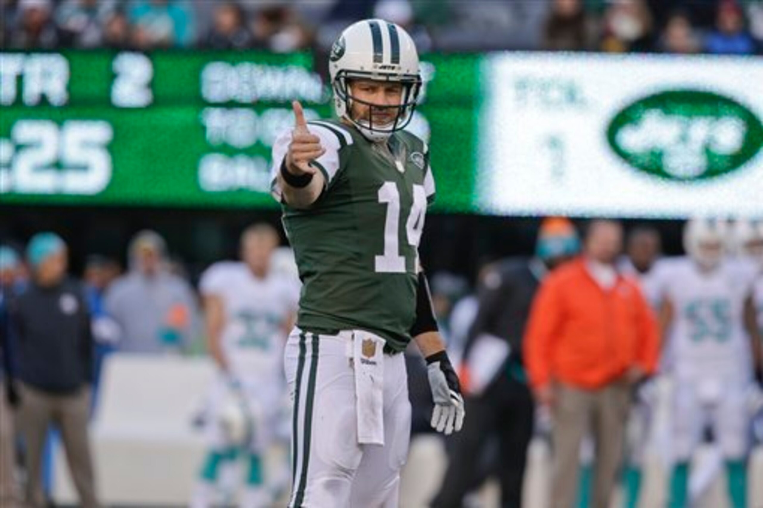 Ryan Fitzpatrick gets the Jets set at the line against the Miami Dolphins. Ryan Fitzpatrick gets the Jets set at the line against the Miami Dolphins.