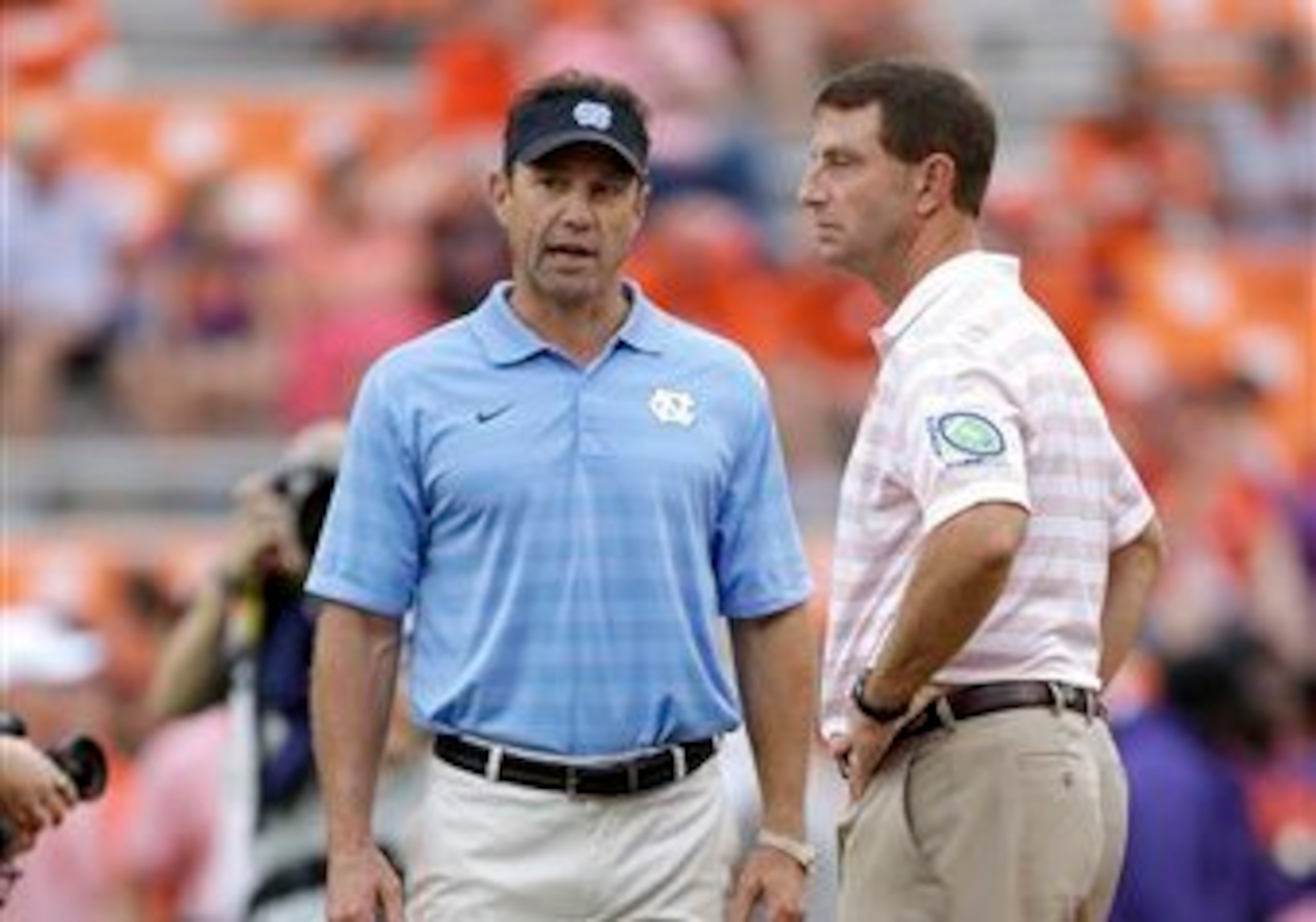 North Carolina HC Larry Fedora and Clemson HC Dabo Swinney