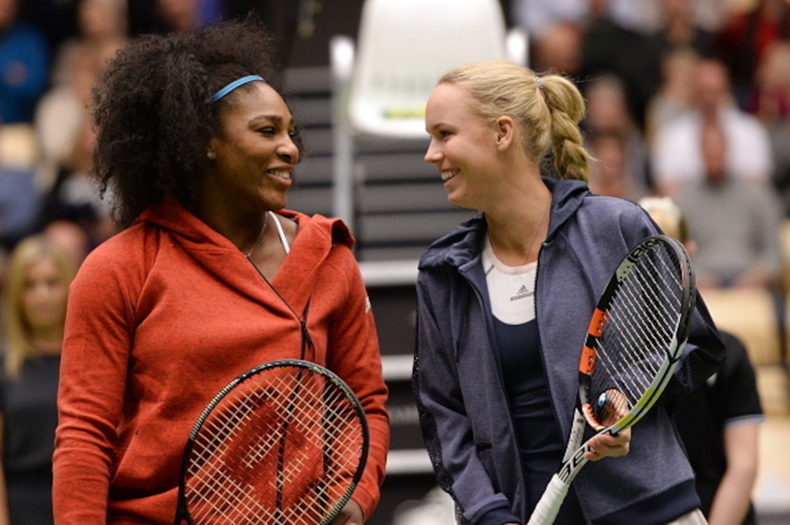 Serena Williams and Caroline Wozniacki talk before an exhibition match in Denmark.