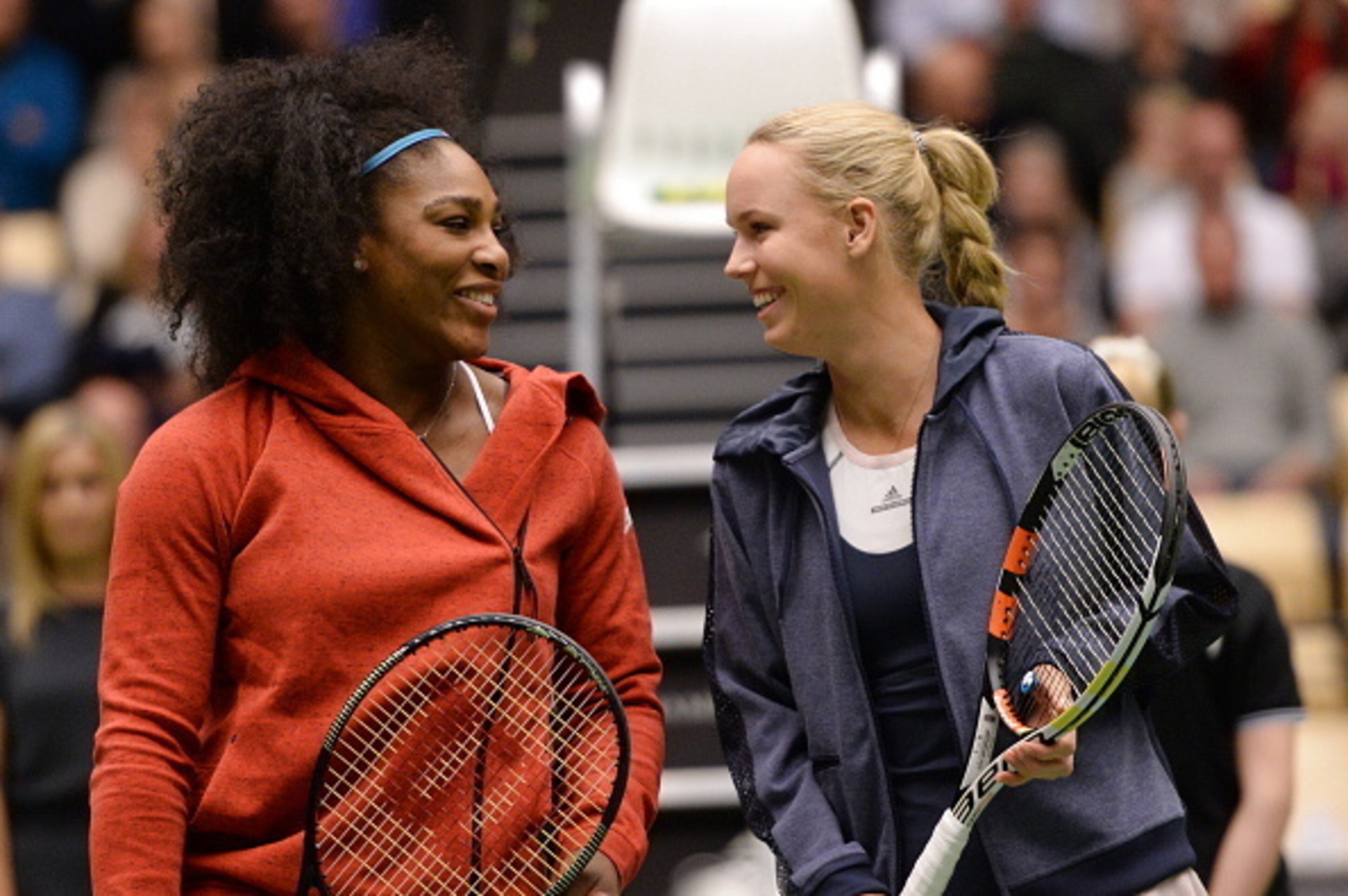 Serena Williams and Caroline Wozniacki talk before an exhibition match in Denmark.
