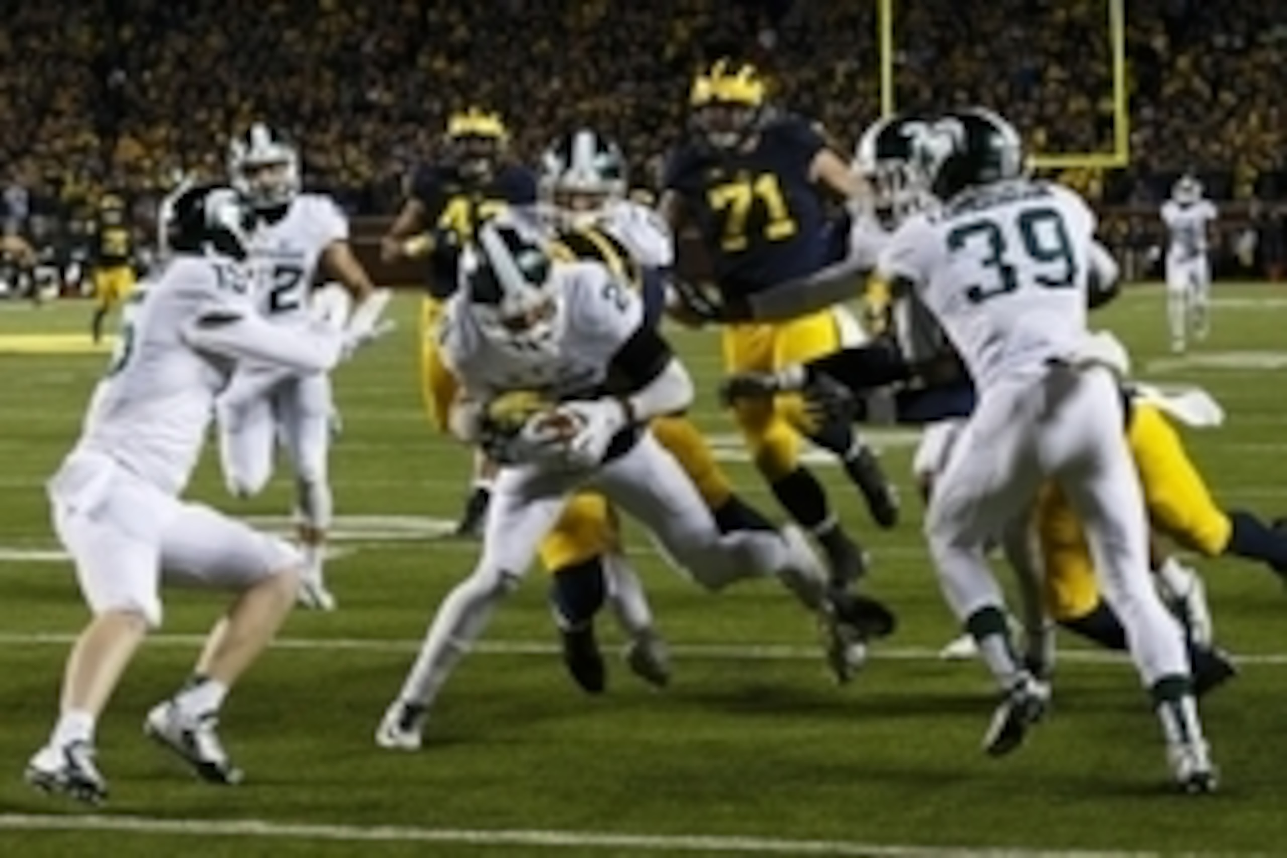 Michigan State DB Jalen Watts-Jackson (center)