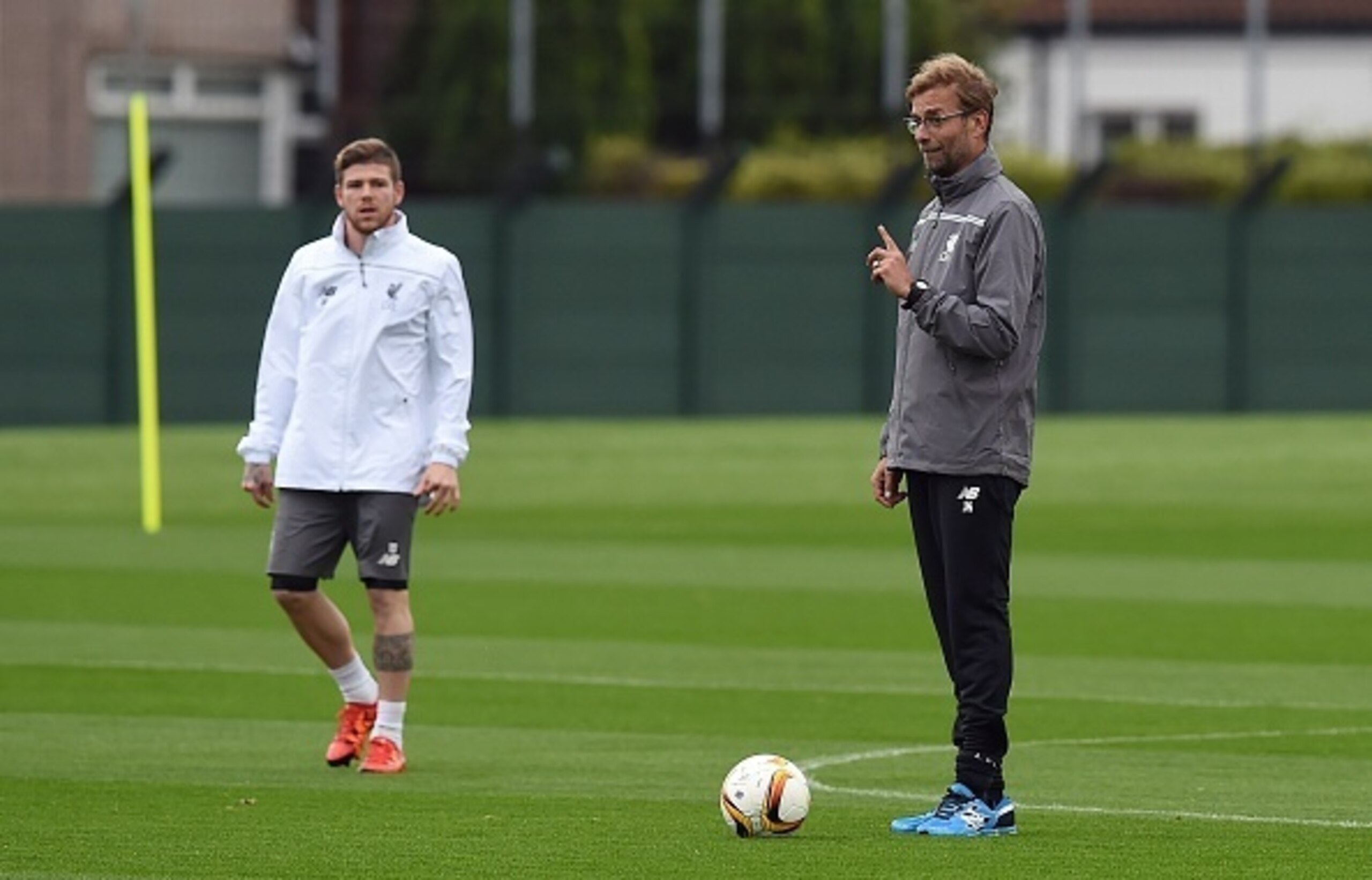 Alberto Moreno (left) and Liverpool manager Jurgen Klopp.