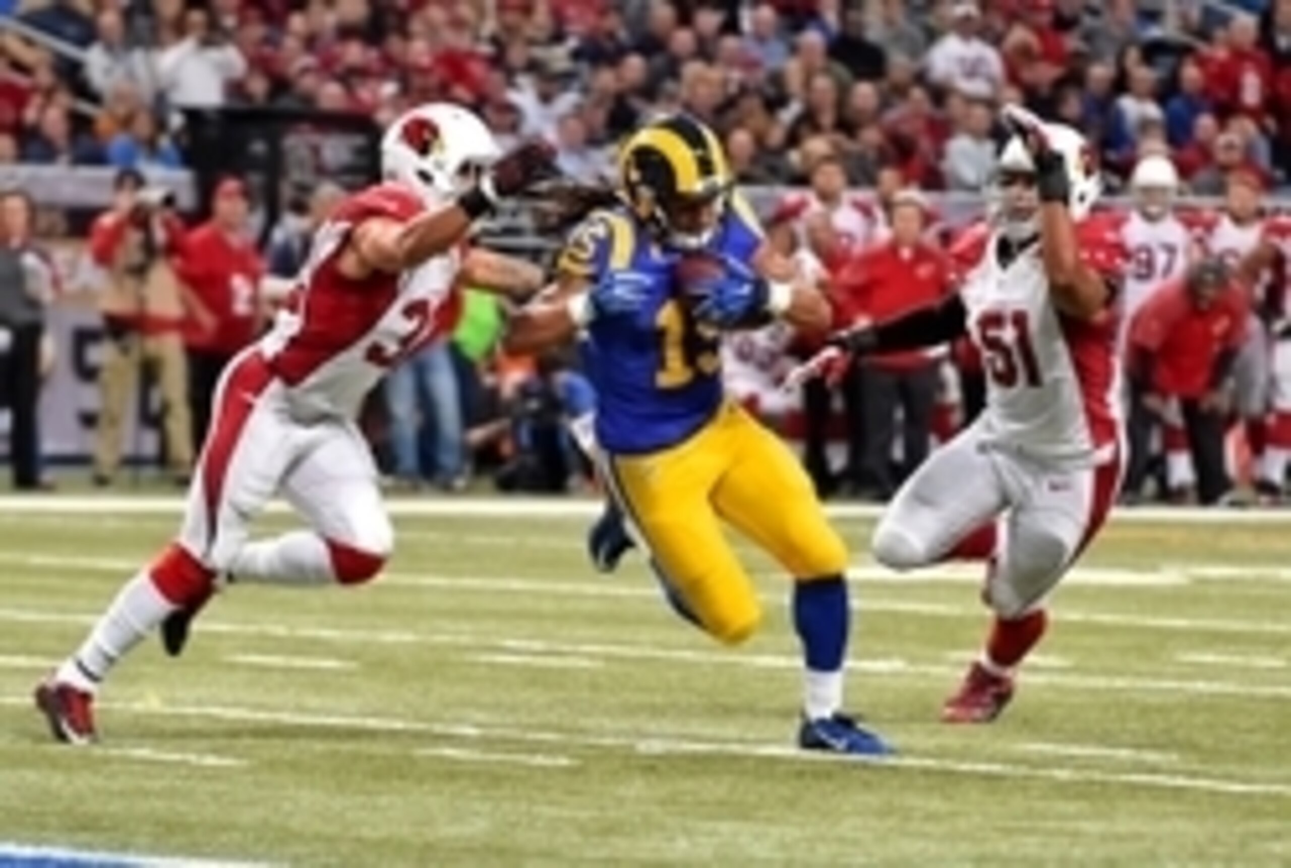 Dec 6, 2015; St. Louis, MO, USA; St. Louis Rams wide receiver Bradley Marquez (15) runs the ball against the Arizona Cardinals during the first half at the Edward Jones Dome. Mandatory Credit: Jasen Vinlove-USA TODAY Sports