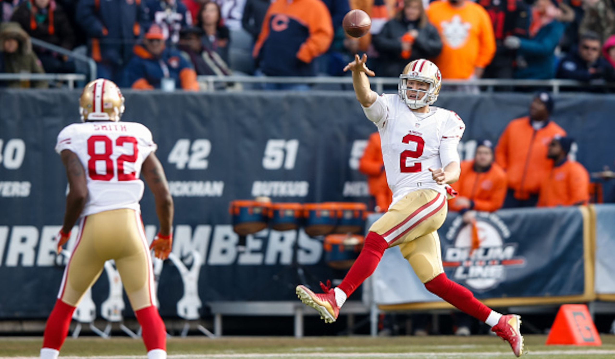 CHICAGO, IL - DECEMBER 06:  Quarterback  Blaine Gabbert #2 of the San Francisco 49ers passes the football to  Torrey Smith #82 in the second quarter against the Chicago Bears at Soldier Field on December 6, 2015 in Chicago, Illinois.  (Photo by Joe Robbin