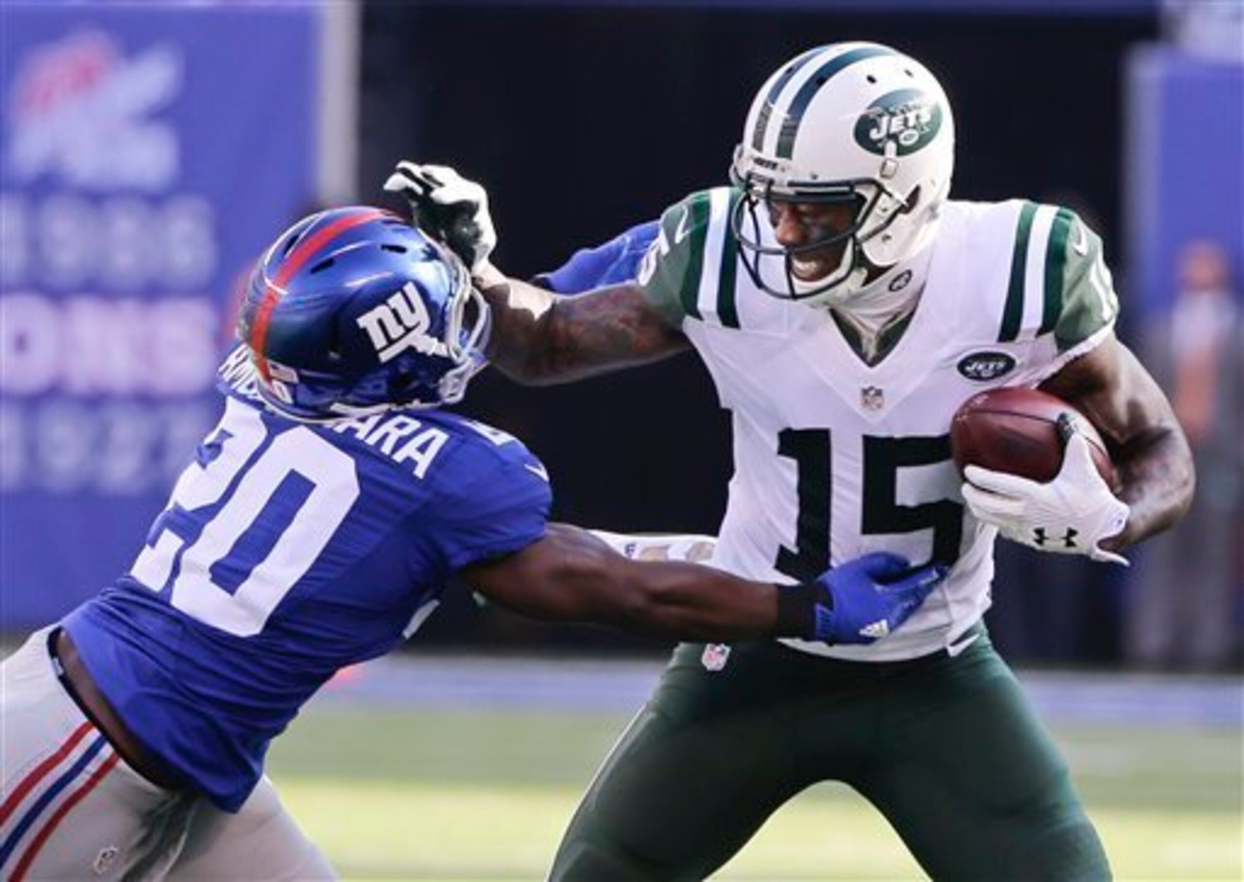 Brandon Marshall fights for extra yards against the Giants.