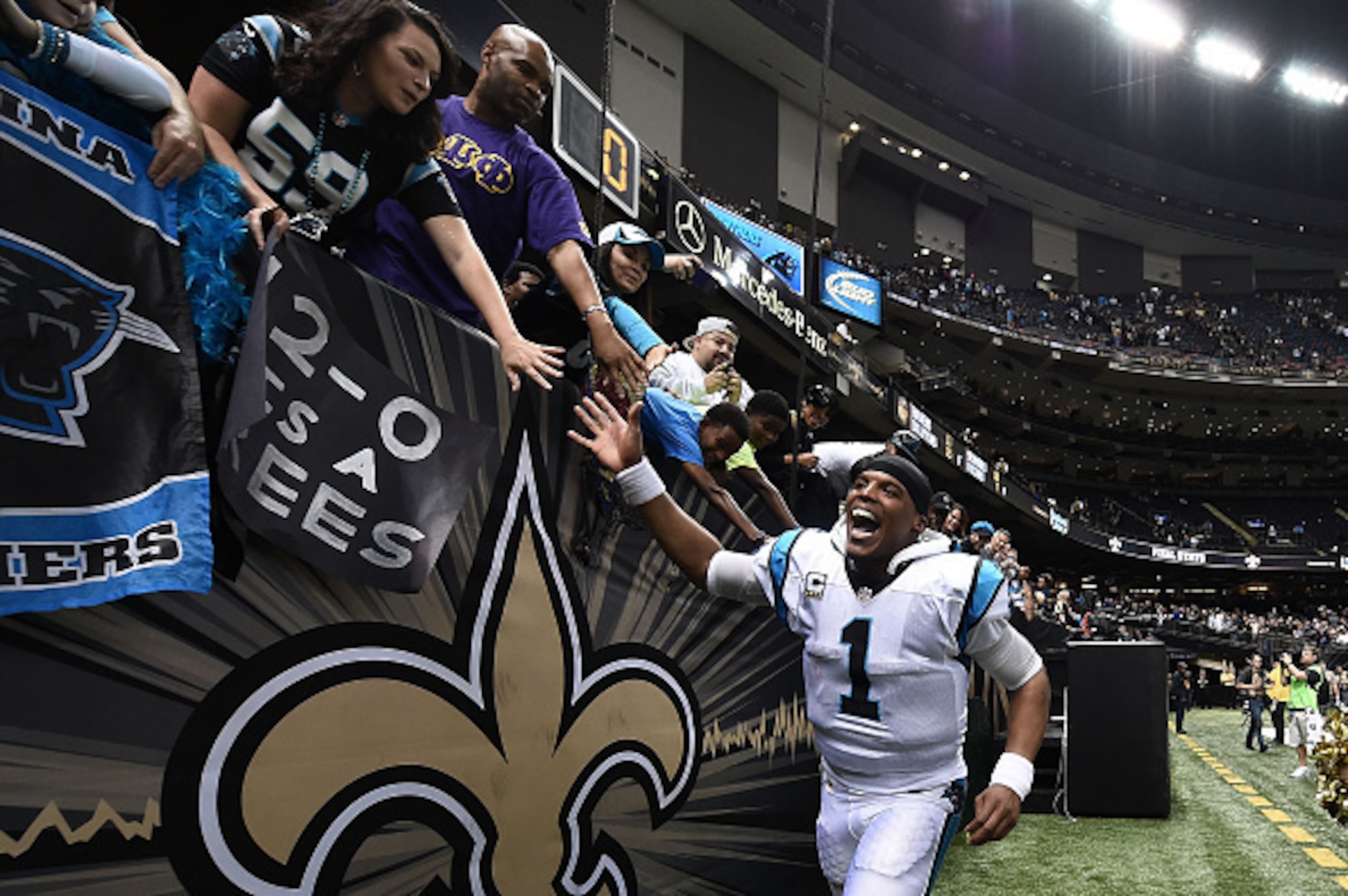 Cam Newton tossed five touchdown passes.