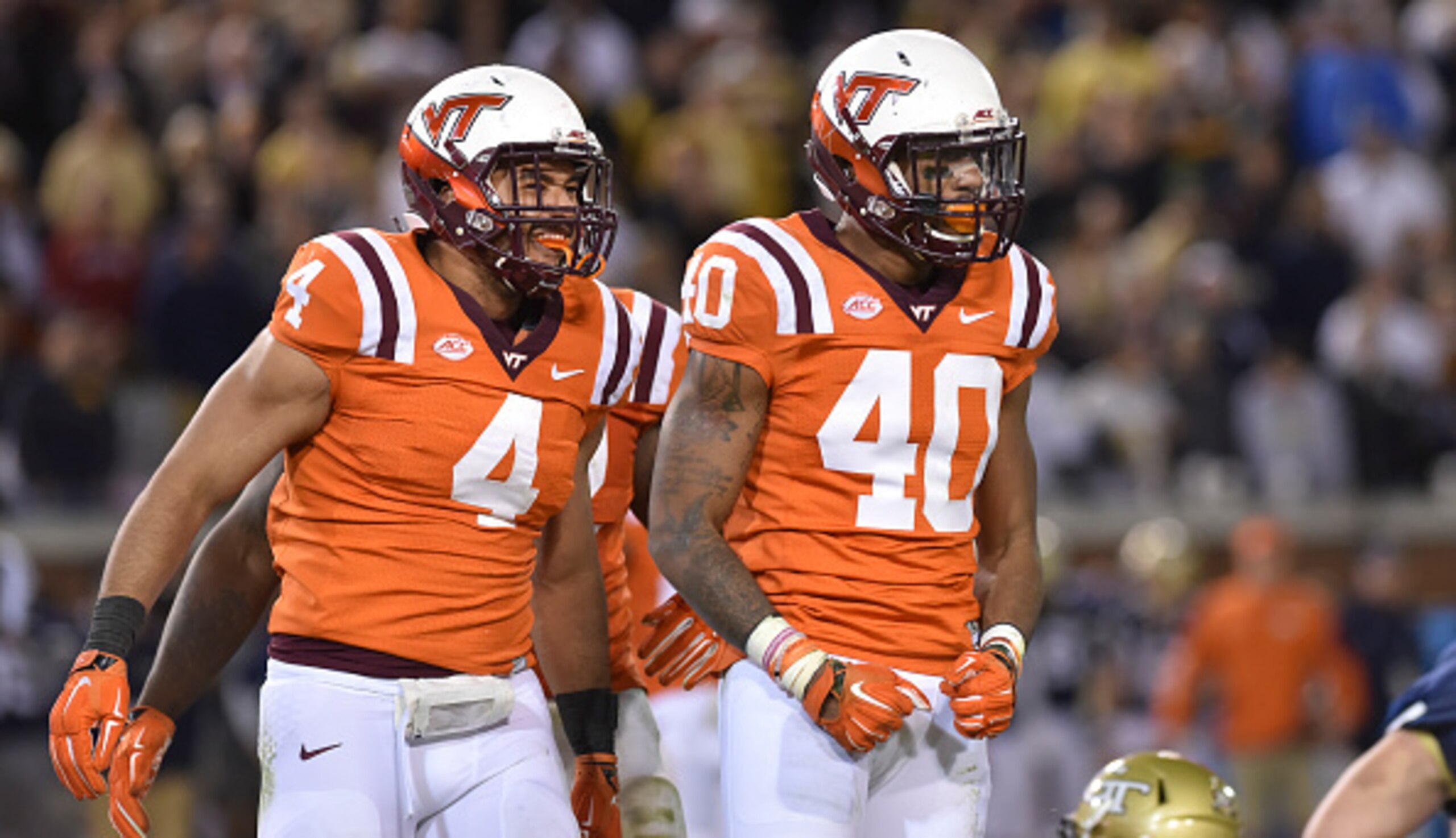 ATLANTA, GA - NOVEMBER 12: Linebacker Deon Clarke #40 of the Virginia Tech Hokies and defensive end Ken Ekanem #4 celebrate a defensive stop in the second half against the Georgia Tech Yellow Jackets at Bobby Dodd Stadium on November 12, 2015 in Atlanta, 