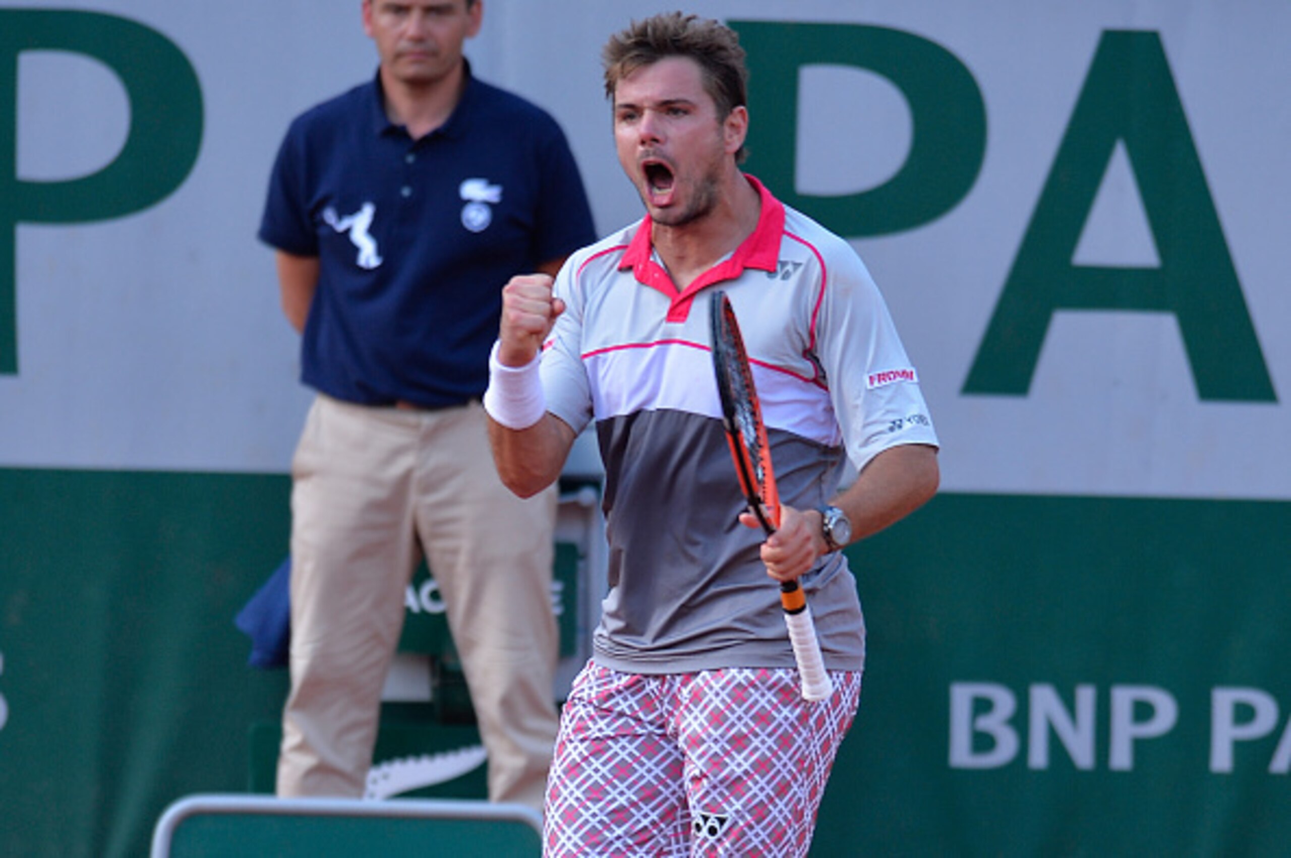 Stan Wawrinka roars after winning a point at the 2015 French Open.