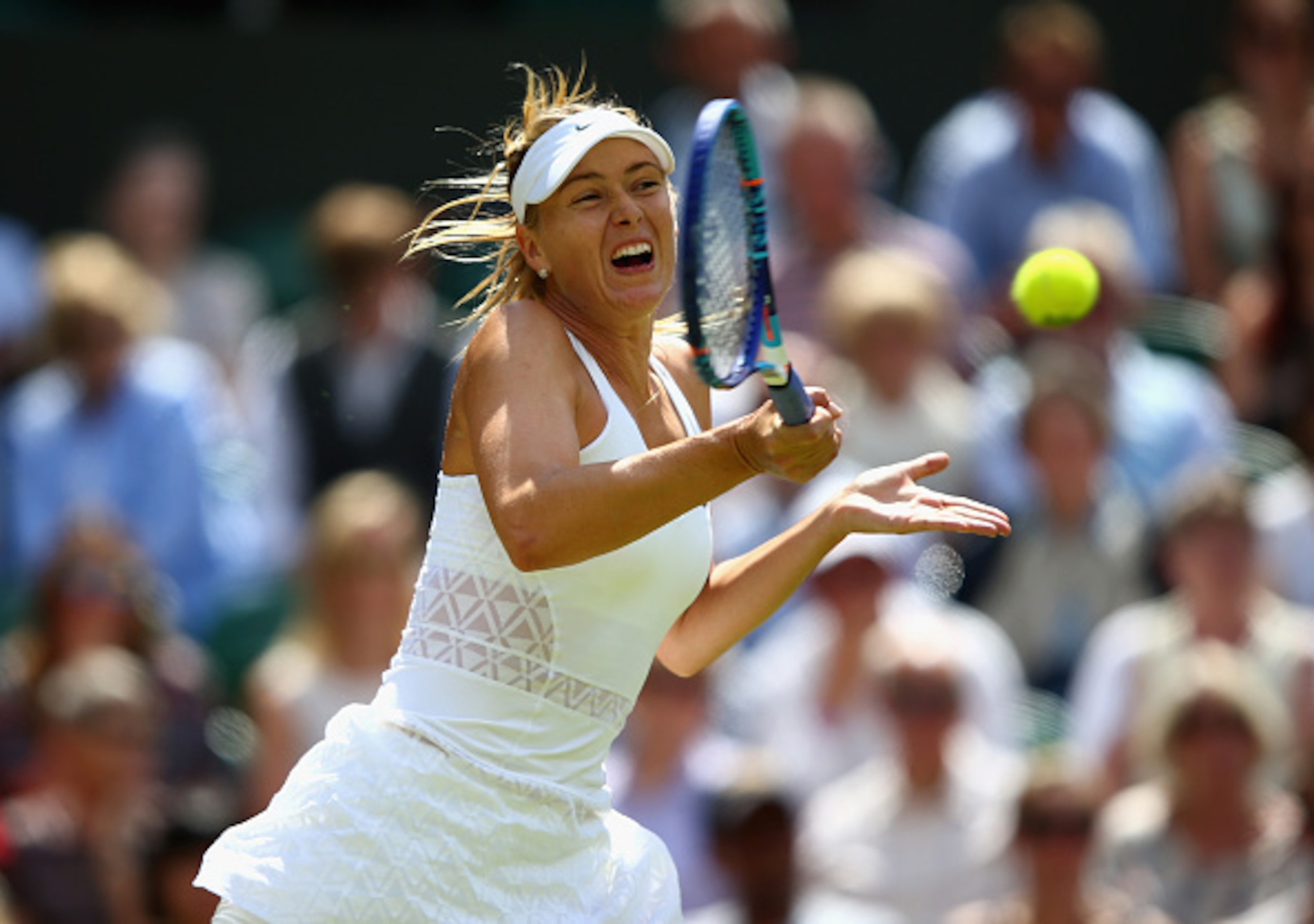 Maria Sharapova hits a forehand during the 2015 Wimbledon Championships.
