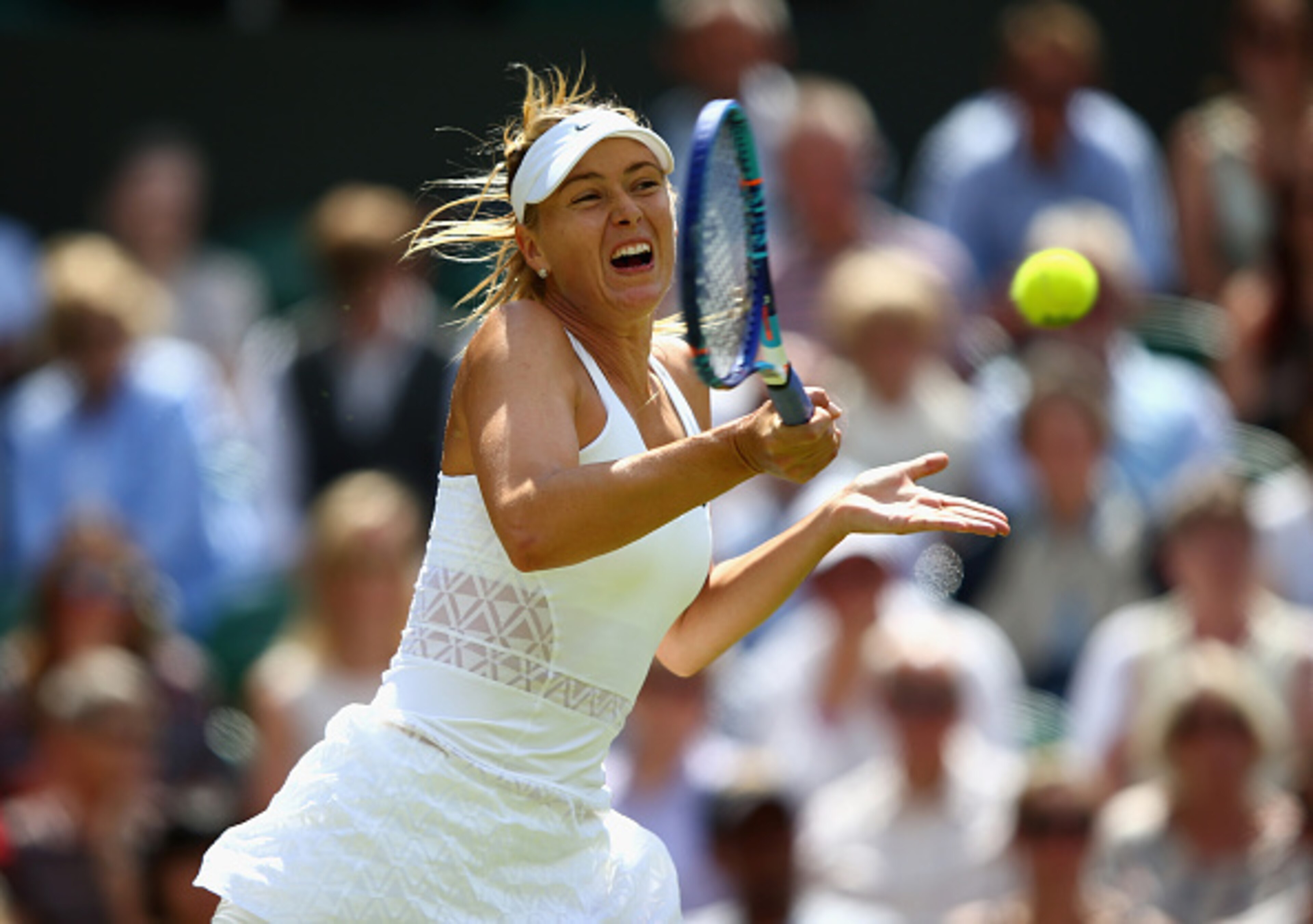 Maria Sharapova hits a forehand during the 2015 Wimbledon Championships.