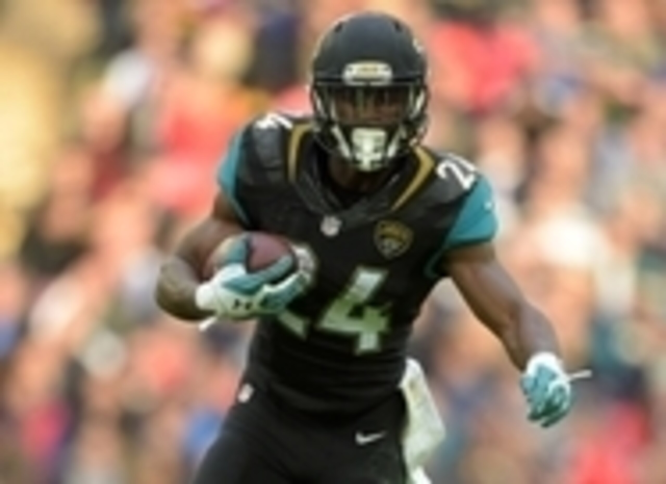 Oct 25, 2015; London, United Kingdom; Jacksonville Jaguars running back T.J. Yeldon (24) carries the ball against the Buffalo Bills during NFL International Series game at Wembley Stadium. Mandatory Credit: Kirby Lee-USA TODAY Sports