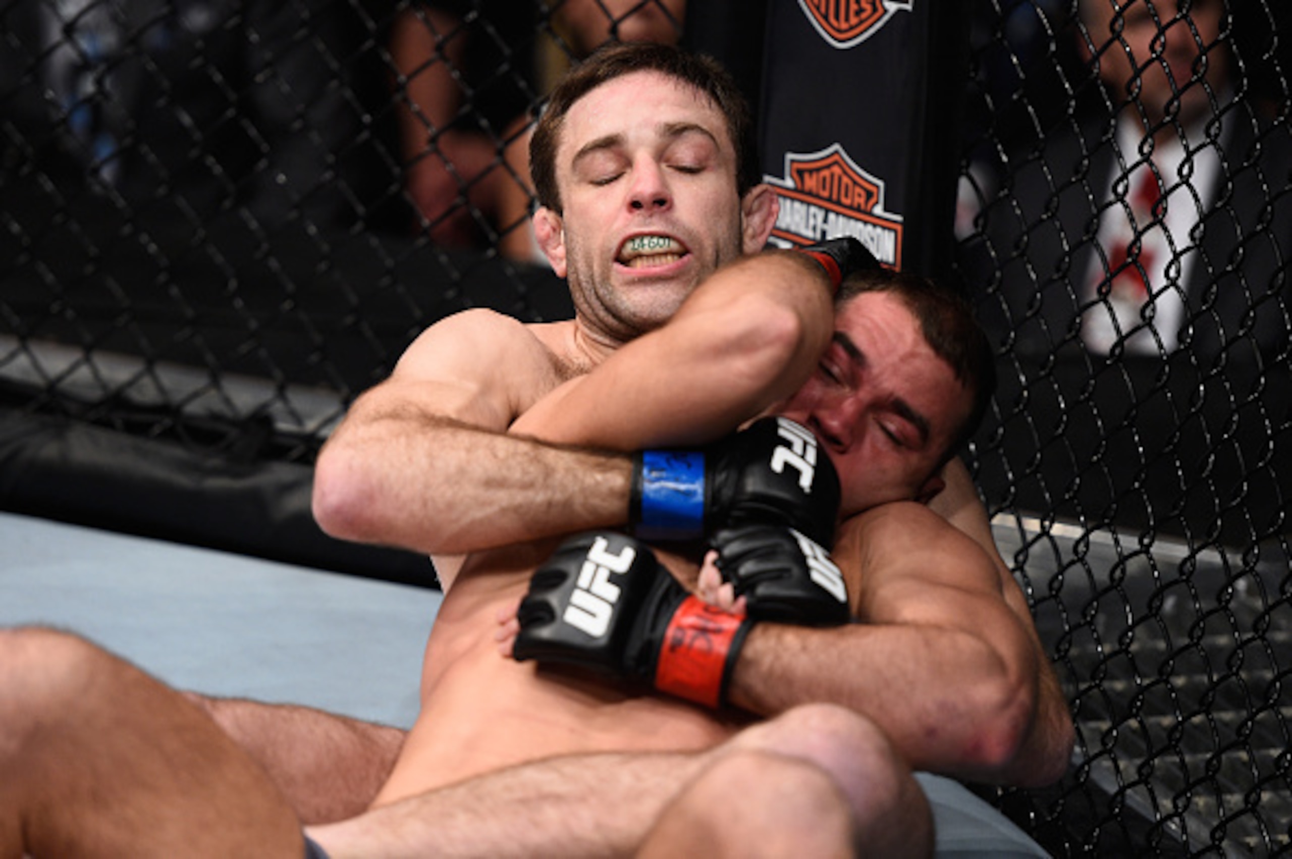 LAS VEGAS, NV - DECEMBER 11: Ryan Hall (back) attempts to submit Artem Lobov in their lightweight finals bout during the TUF Finale event inside The Chelsea at The Cosmopolitan of Las Vegas on December 11, 2015 in Las Vegas, Nevada.  (Photo by Jeff Bottar