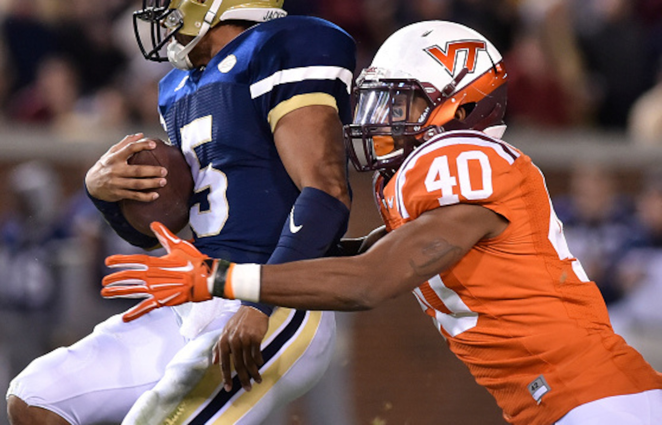Deon Clarke puts the heat on Georgia Tech QB Justin Thomas.