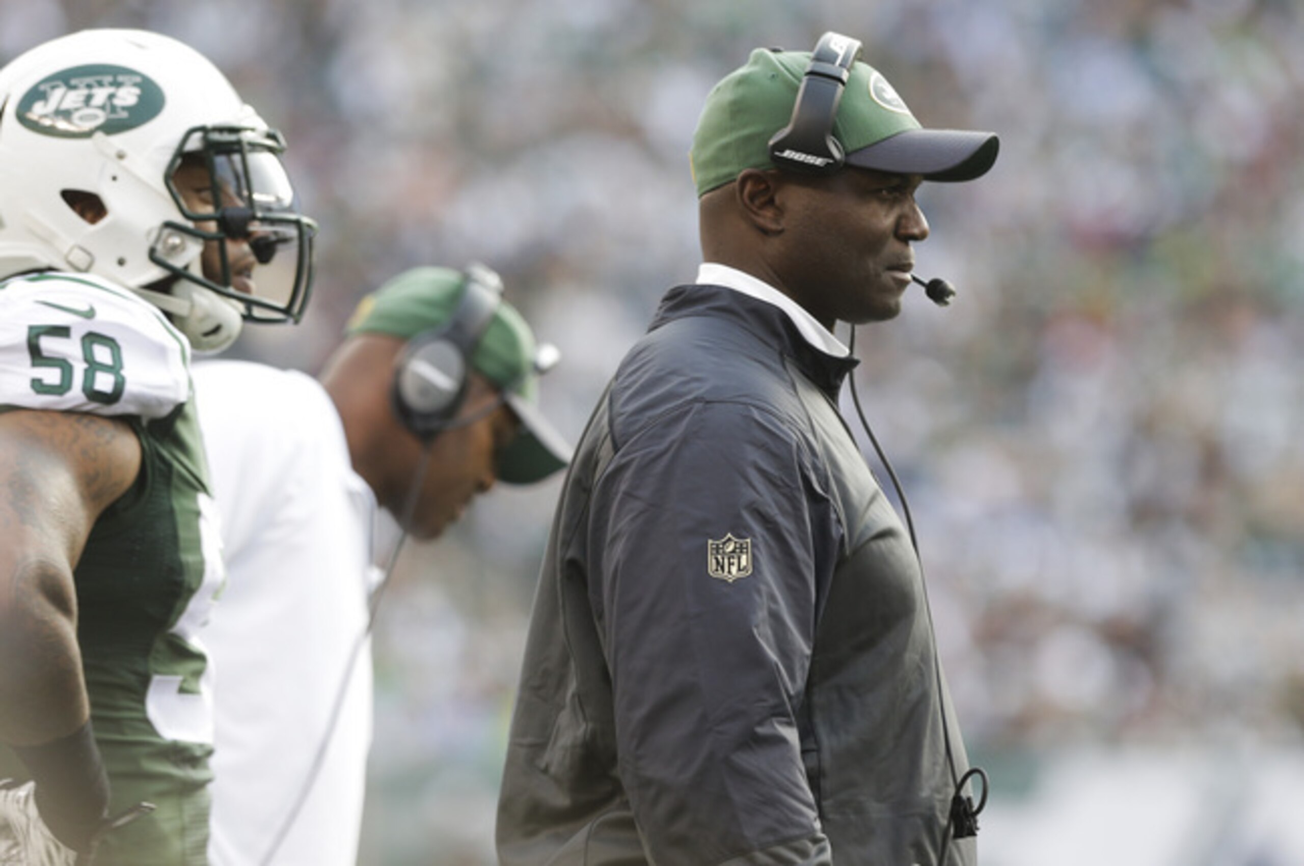 Todd Bowles stands on the sideline during the Jets victory over the Titans.