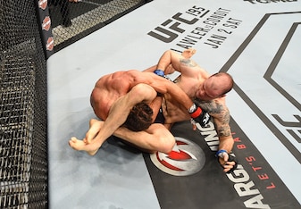 Tamdan McCrory (right) outgrappled Josh Samman.