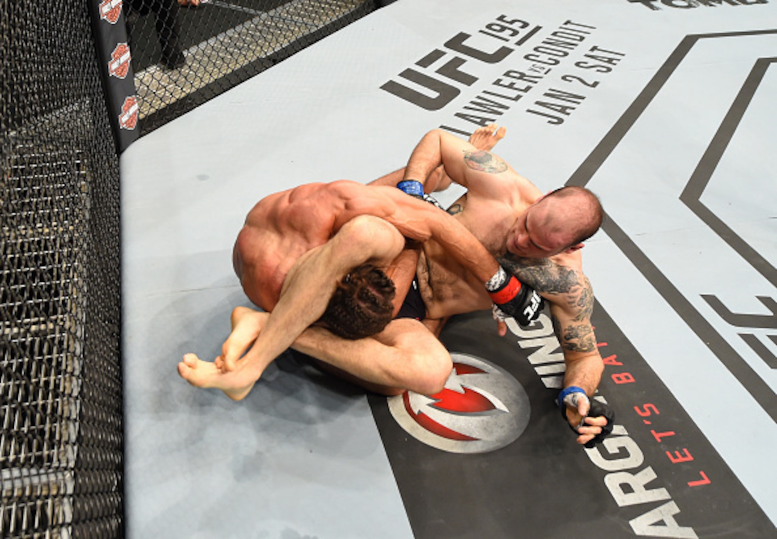 Tamdan McCrory (right) outgrappled Josh Samman.