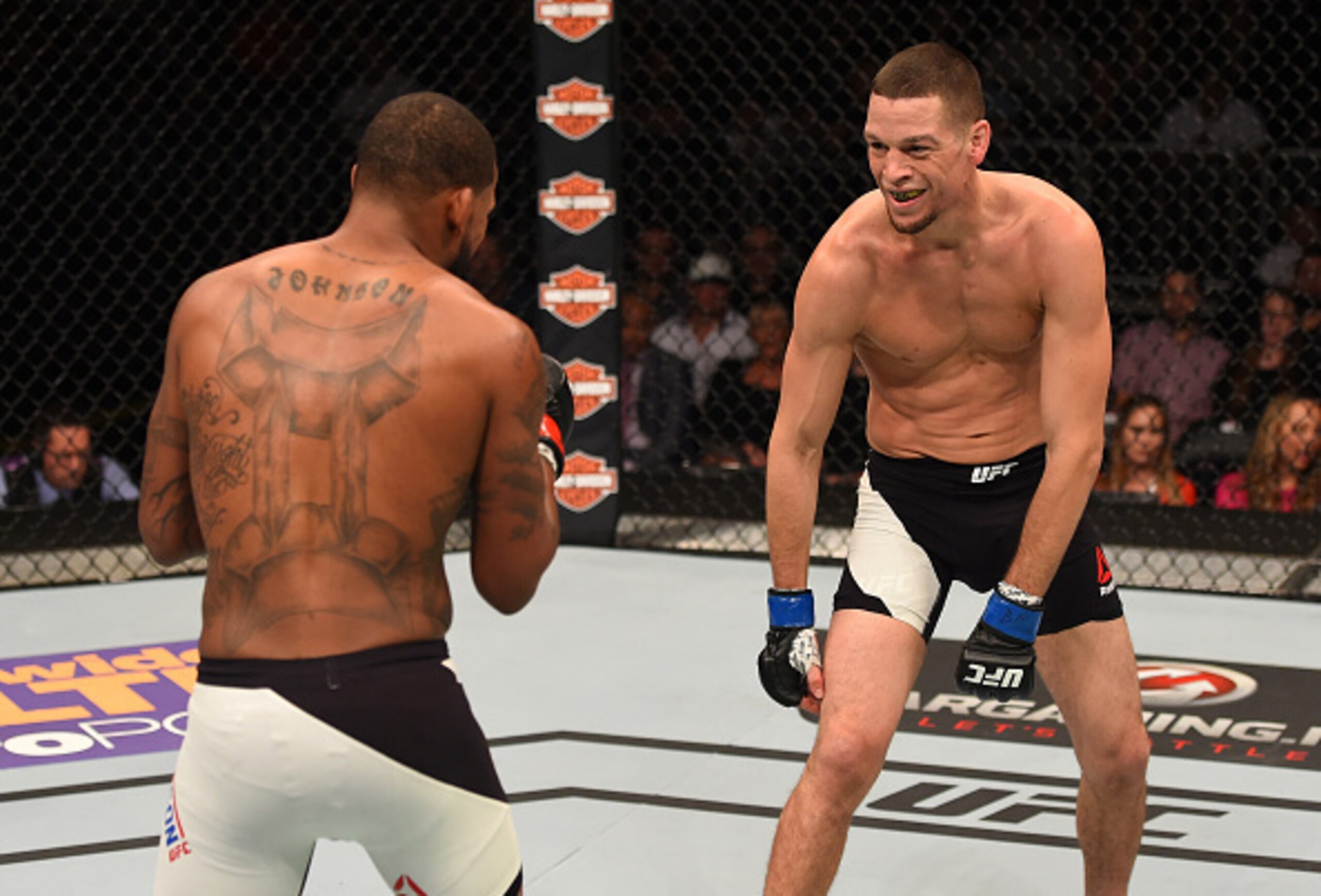 Nate Diaz goads Michael Johnson on during their Fight of the Night battle.